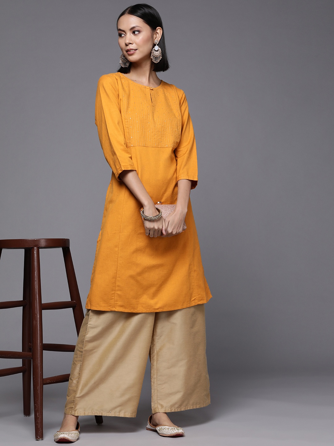 

Fabindia FabBasic Women Mustard Yellow Yoke Design Thread Work Sequin Detail Cotton Linen Kurta