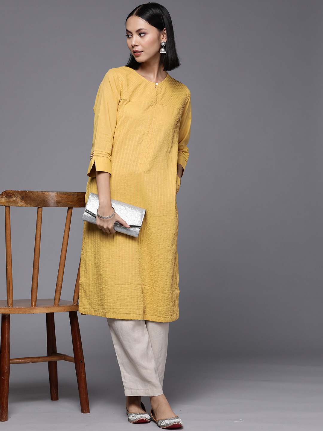 

Fabindia FabBasic Women Yellow Solid Gathered & Pleated Pure Cotton Kurta