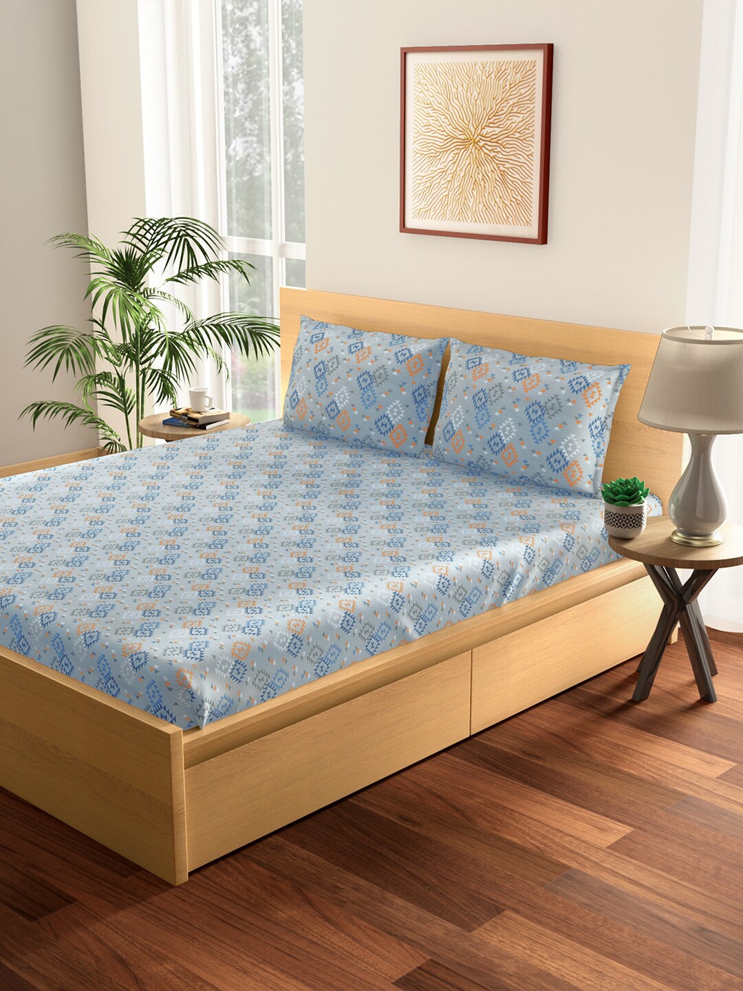 

Living scapes by Pantaloons Blue & Orange Geometric 144 TC King Bedsheet with 2 Pillow Covers
