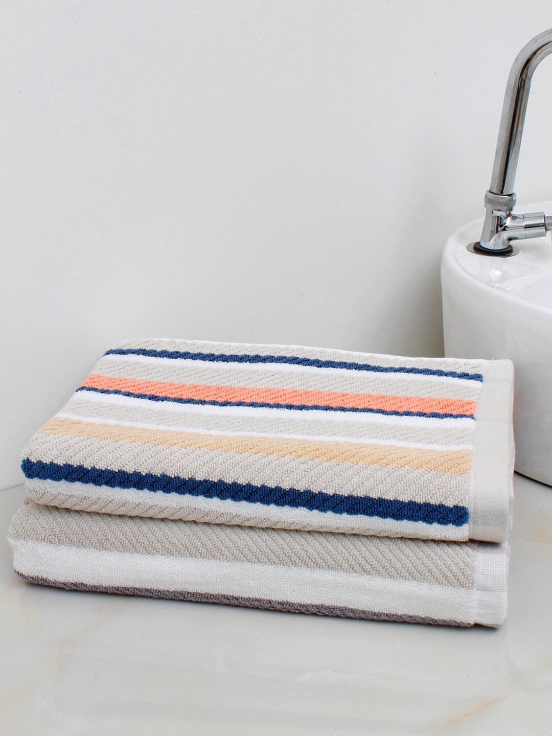 

AVI Living Pack Of 2 Coral & Beige Striped 600 GSM Pure Cotton Bath Towels