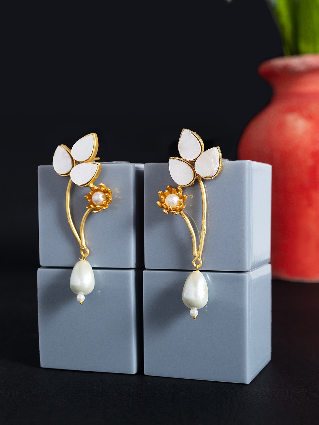 

Golden Peacock Gold-Toned & White Leaf Shaped Studs Earrings