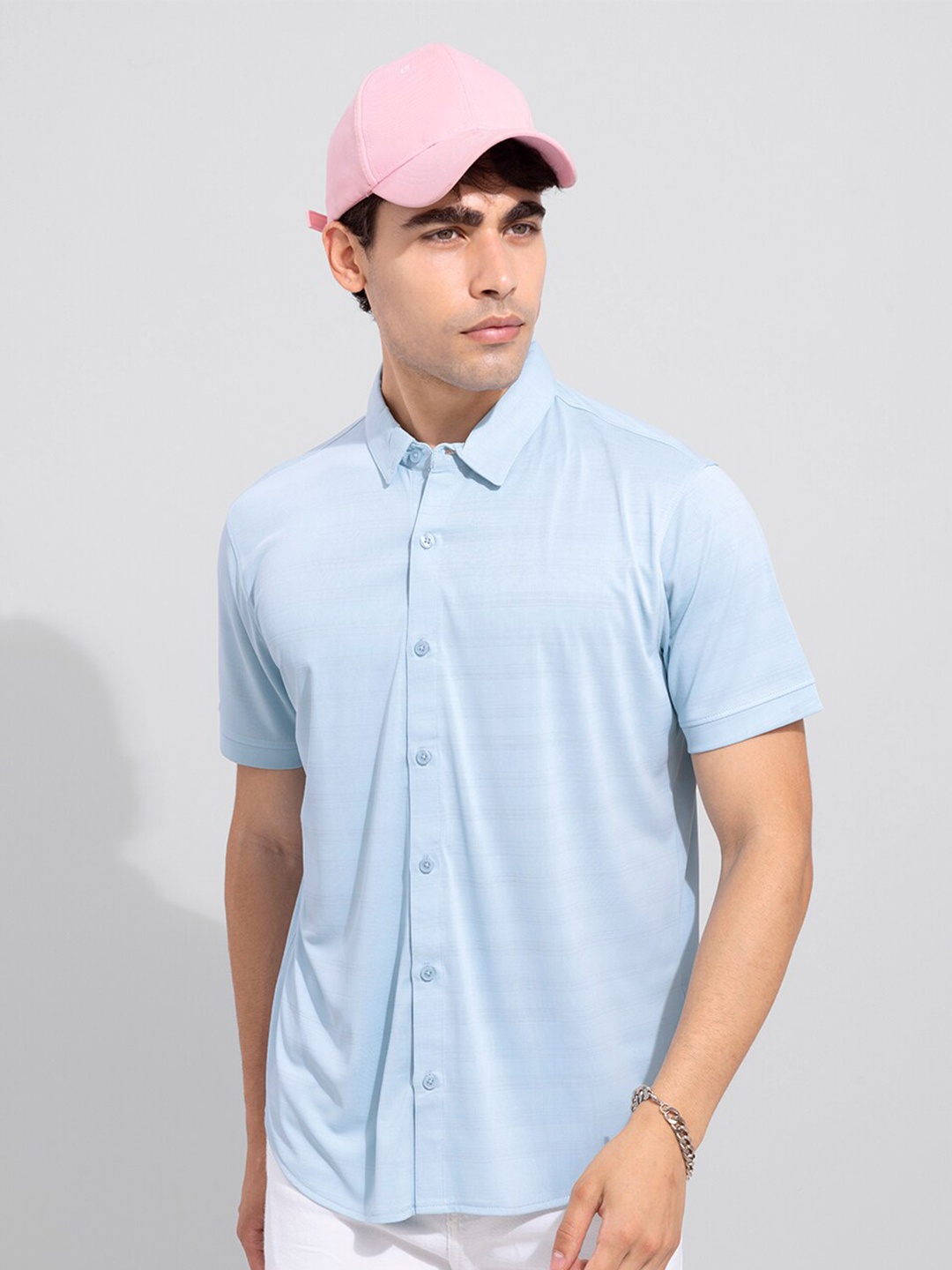

Snitch Men Blue Solid Slim Fit Casual Shirt