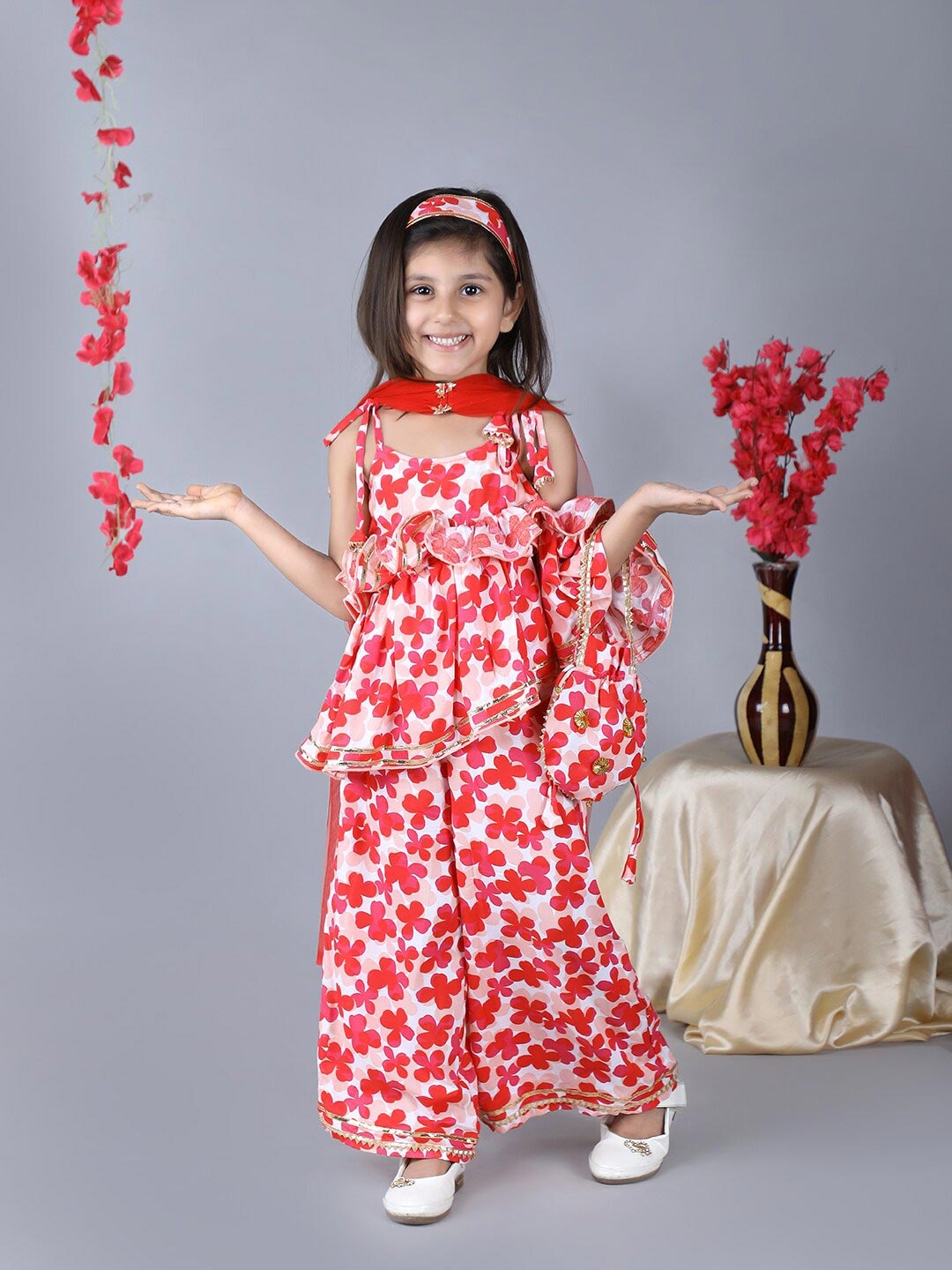 

Beyabella Girls Red Floral Printed Kurti With Palazzos & With Dupatta & Potli Bag
