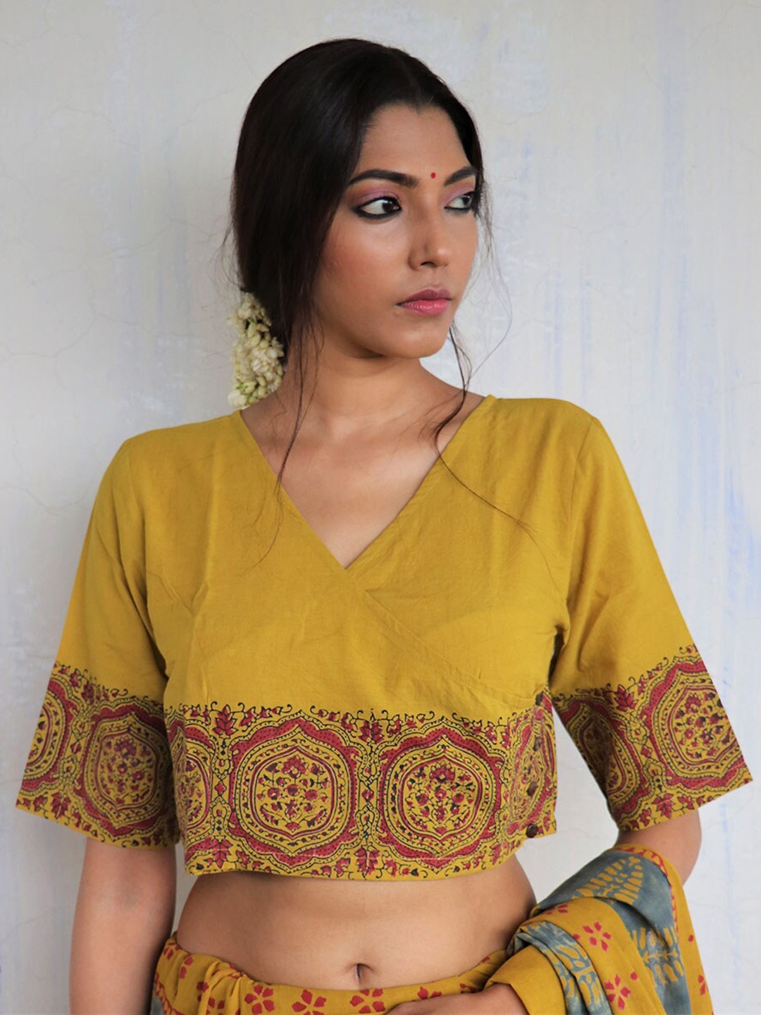 

Chidiyaa Women Mustard Printed Cotton Crop Top Blouse