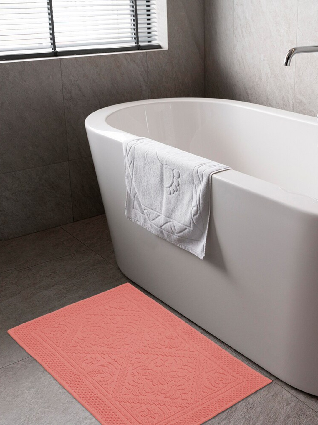 

Pano Coral Colored Self Design 1902 GSM Pure Cotton Bath Rugs