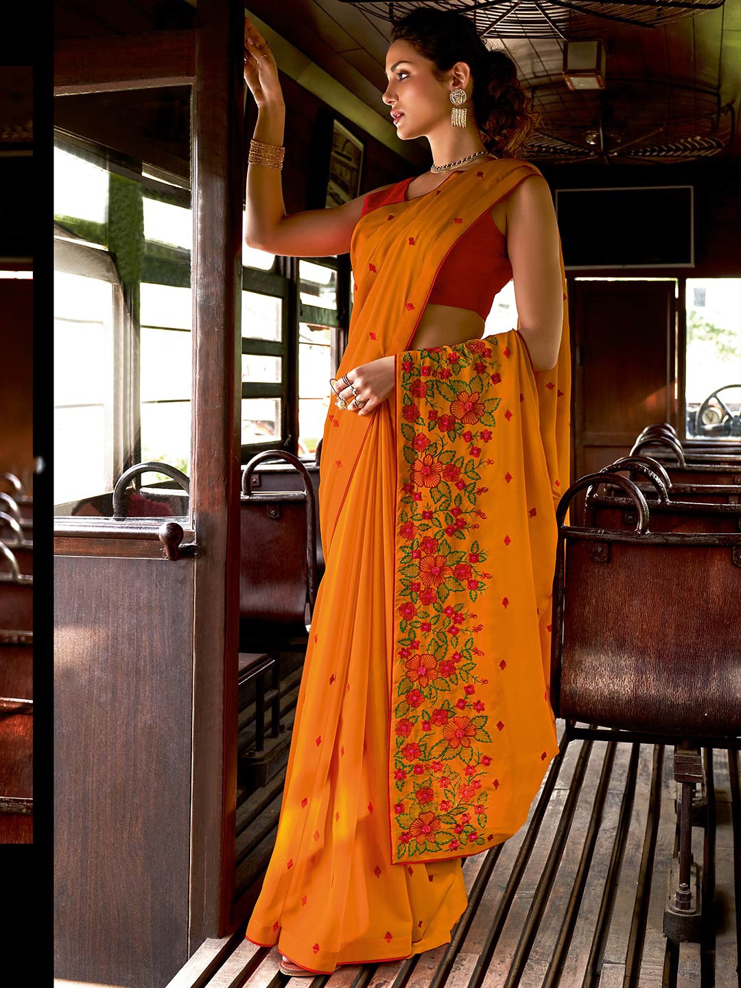 

Shaily Mustard & Green Floral Embroidered Pure Chiffon Saree