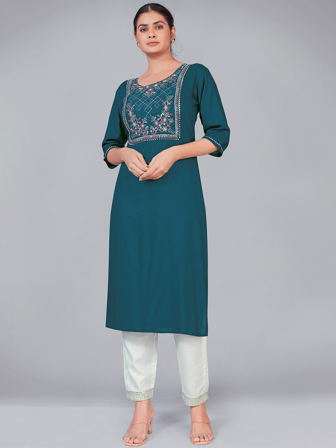 

MONJOLIKA FASHION Women Teal Floral Yoke Design Kurti with Trousers