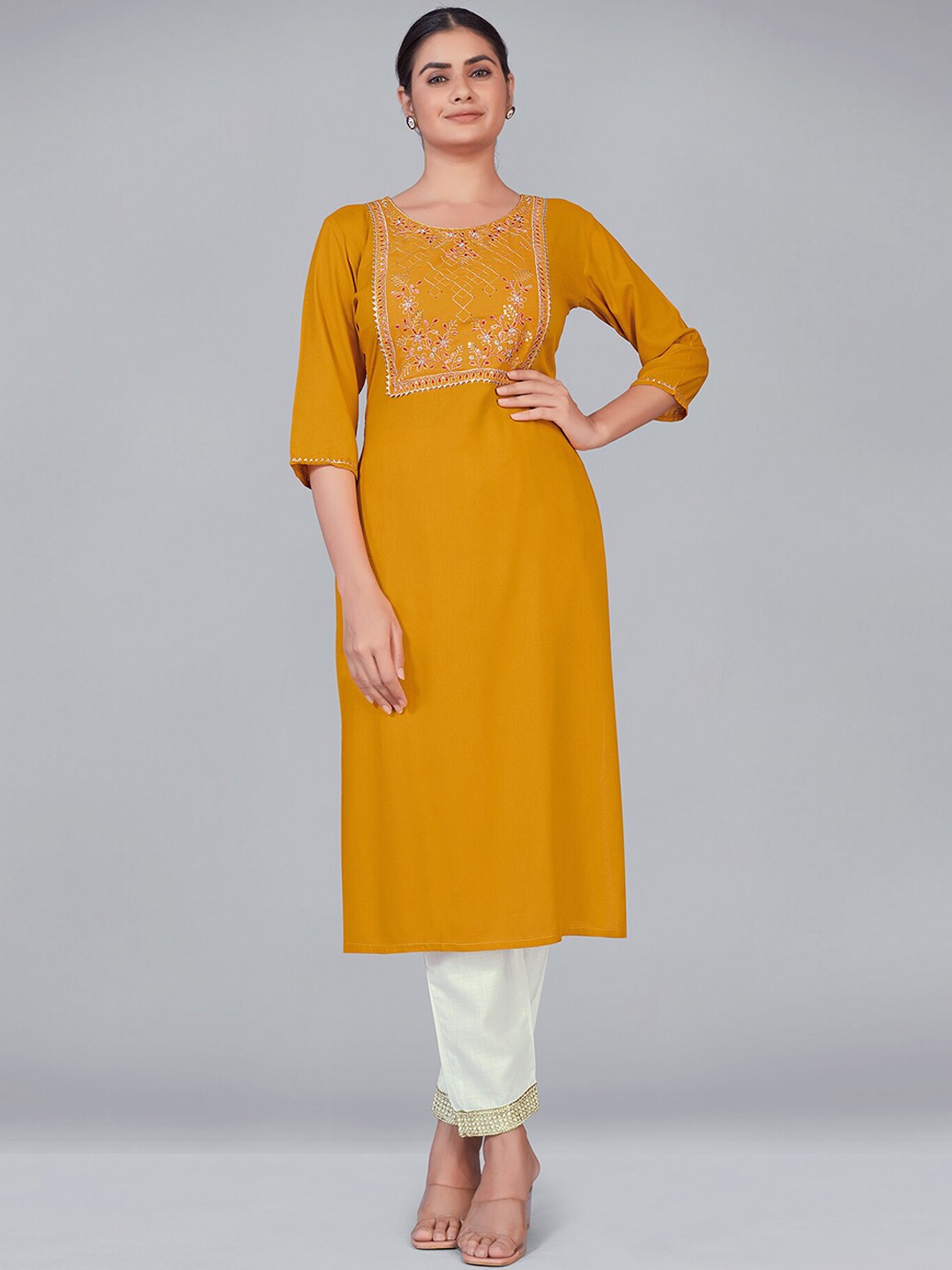 

MONJOLIKA FASHION Women Mustard Yellow Yoke Design Sequinned Kurta with Trousers