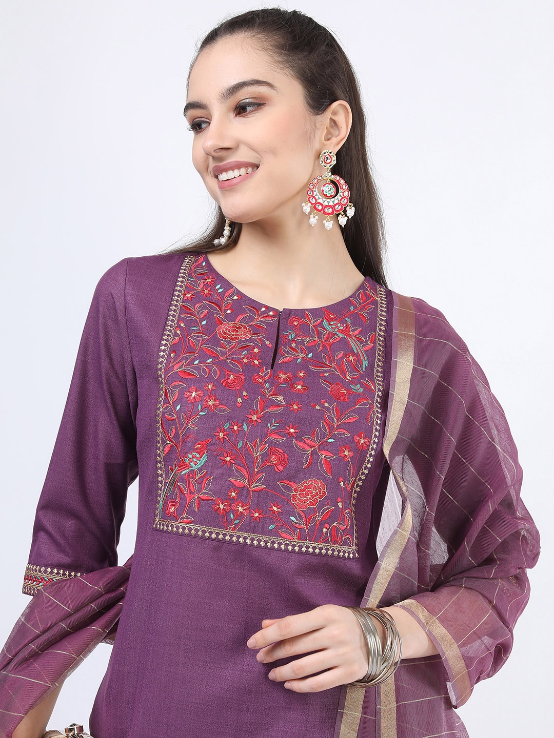 

Vishudh Women Purple Floral Yoke Design Kurta with Trousers & With Dupatta