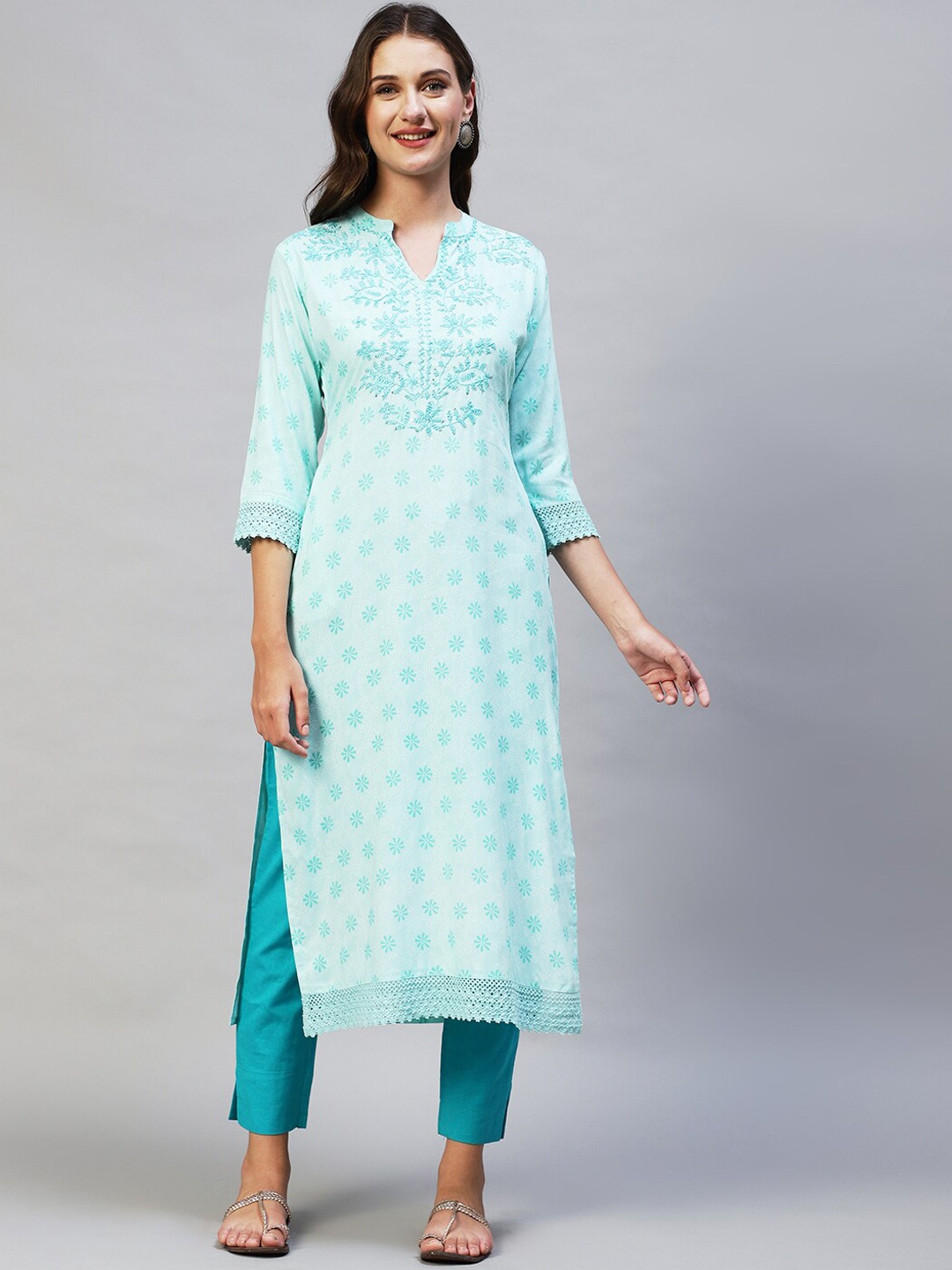 

FASHOR Women Turquoise Blue Ethnic Motifs Printed Thread Work Kurta