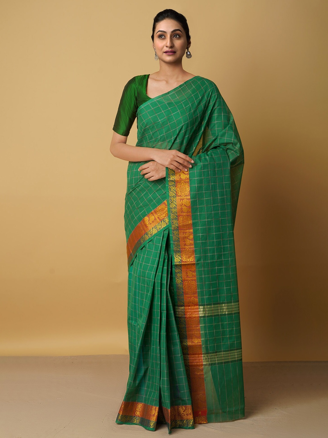 

Unnati Silks Green & Mustard Woven Design Zari Pure Cotton Venkatgiri Saree