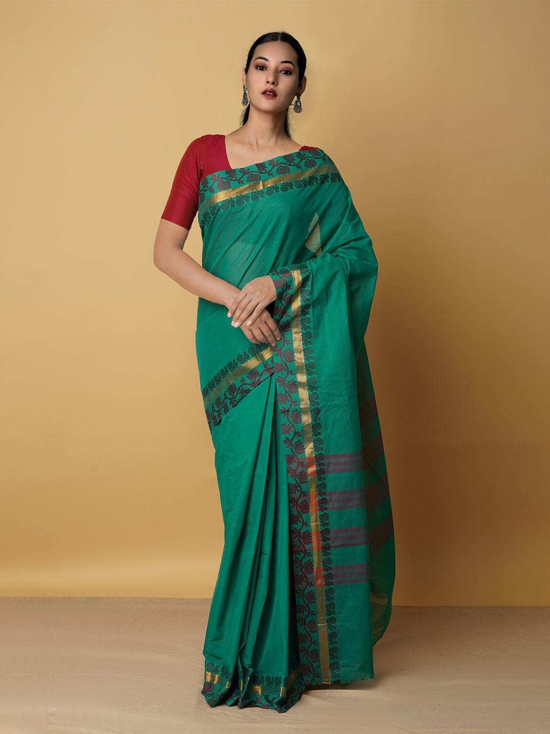 

Unnati Silks Green & Purple Woven Design Zari Pure Cotton Venkatgiri Saree