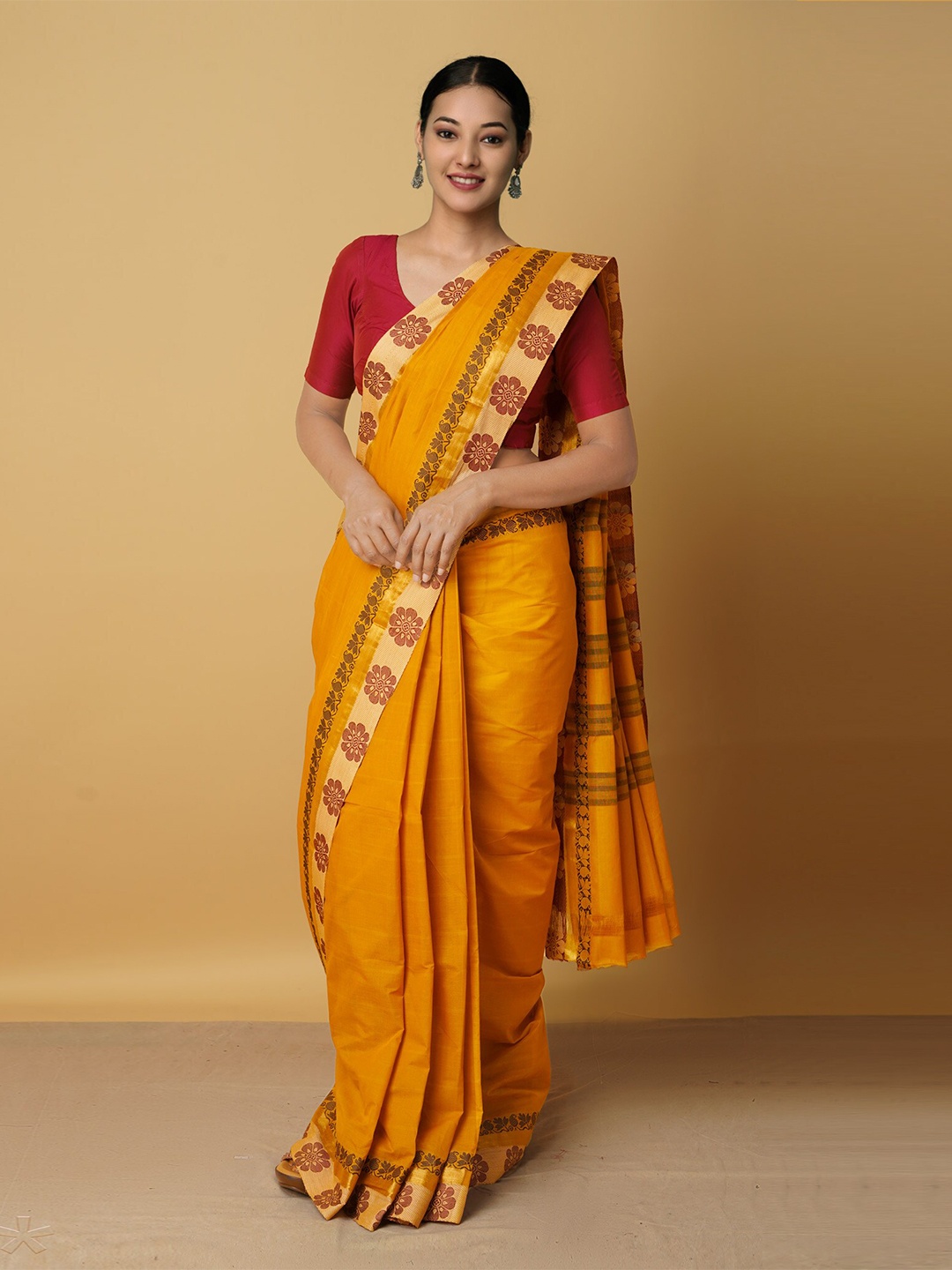 

Unnati Silks Brown & Gold-Toned Floral Zari Pure Cotton Venkatgiri Saree