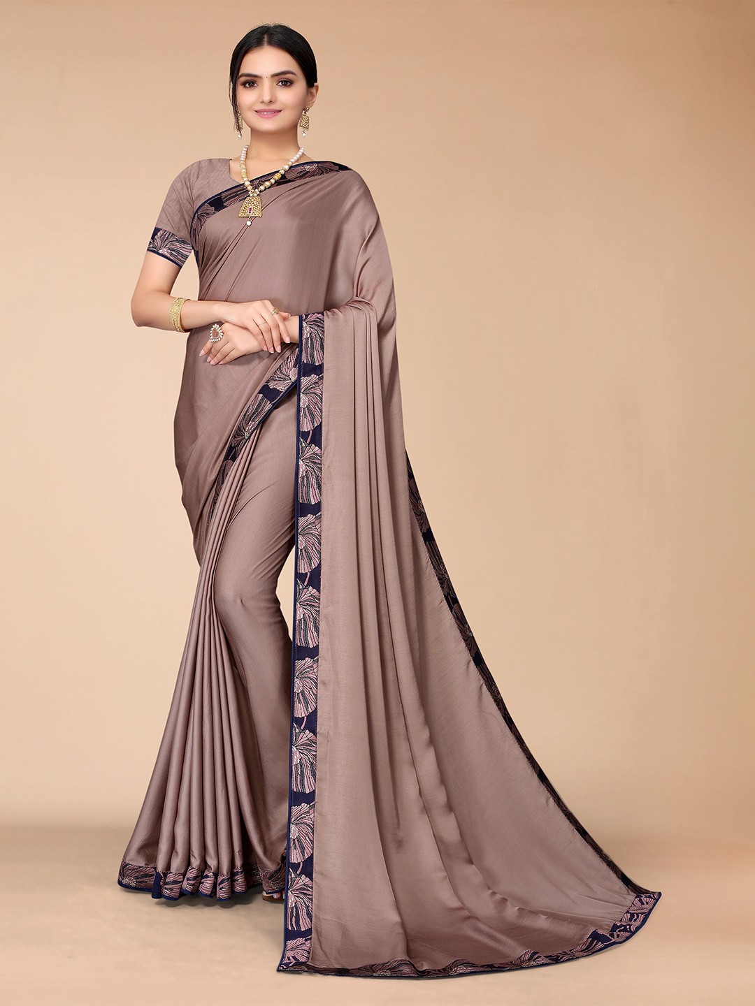 

Mitera Brown & Blue Solid saree with printed border Satin Saree