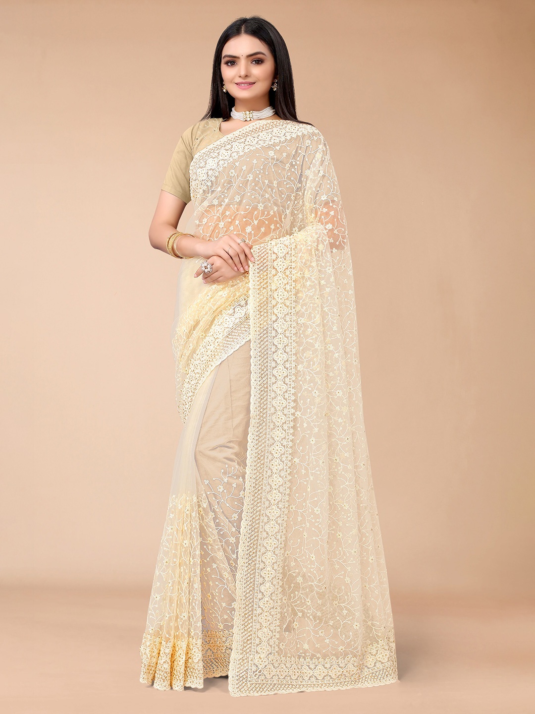 

Mitera Beige & White Floral Embroidered Net Saree