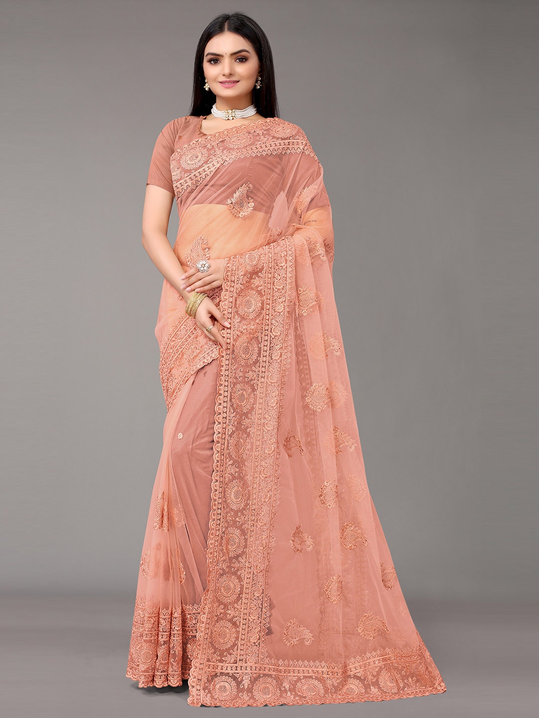 

Nimayaa Rust Ethnic Motifs Embroidered Net Saree