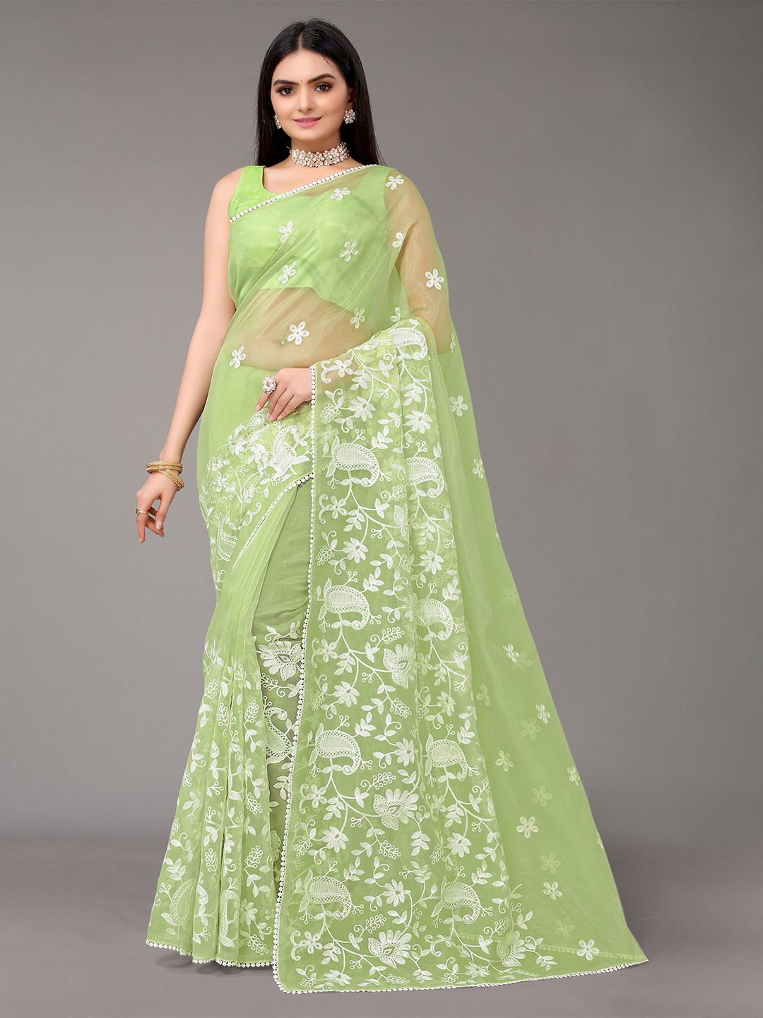 

Nimayaa Green Colored Organza Embroidered Saree with matching net Blouse