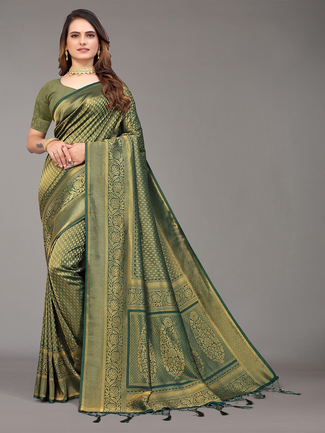 

Nimayaa Green & Gold-Toned Ethnic Motifs Zari Silk Blend Kanjeevaram Saree