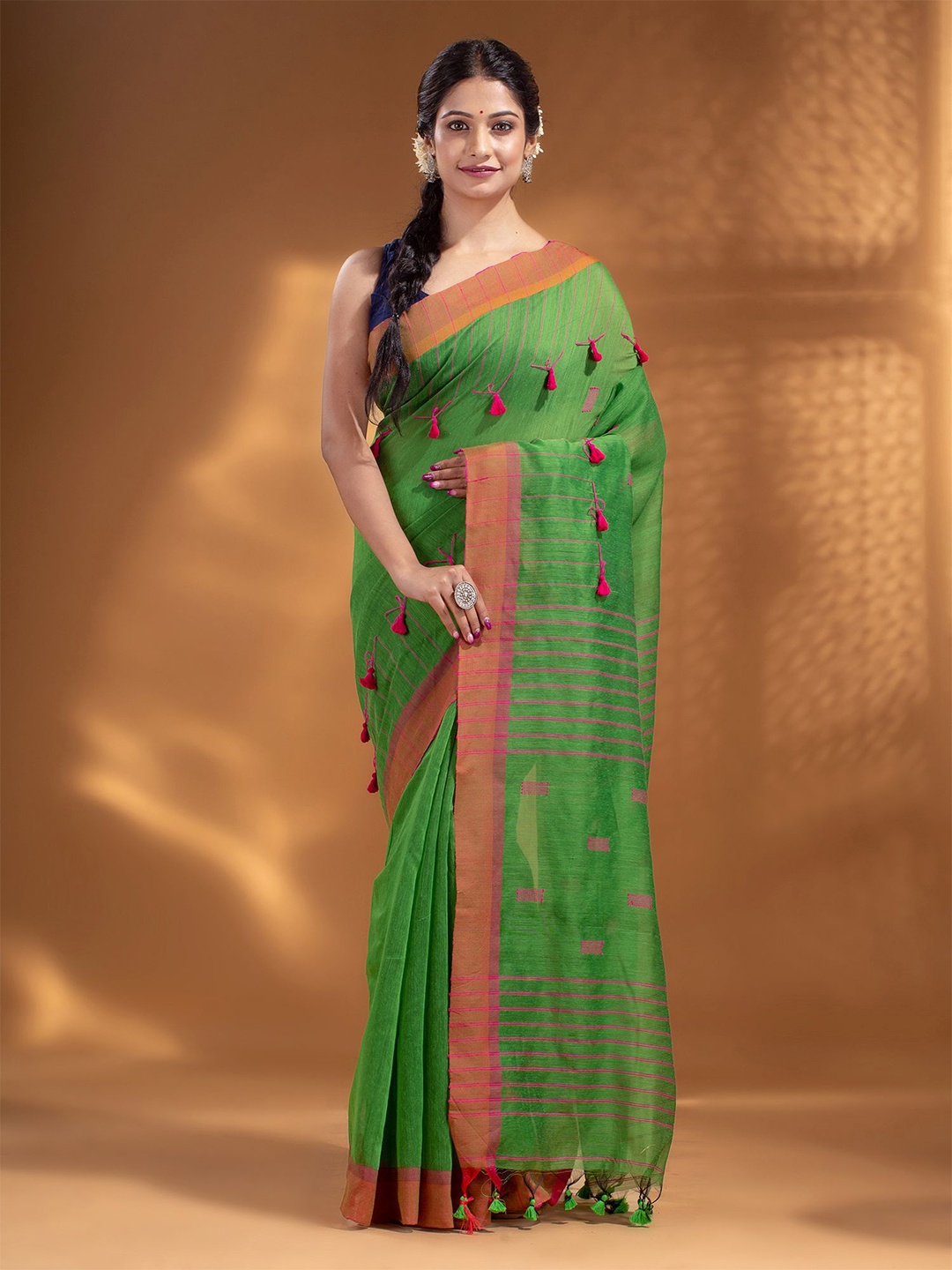 

Arhi Green & Orange Tasseled Woven Design Cotton Blend Saree