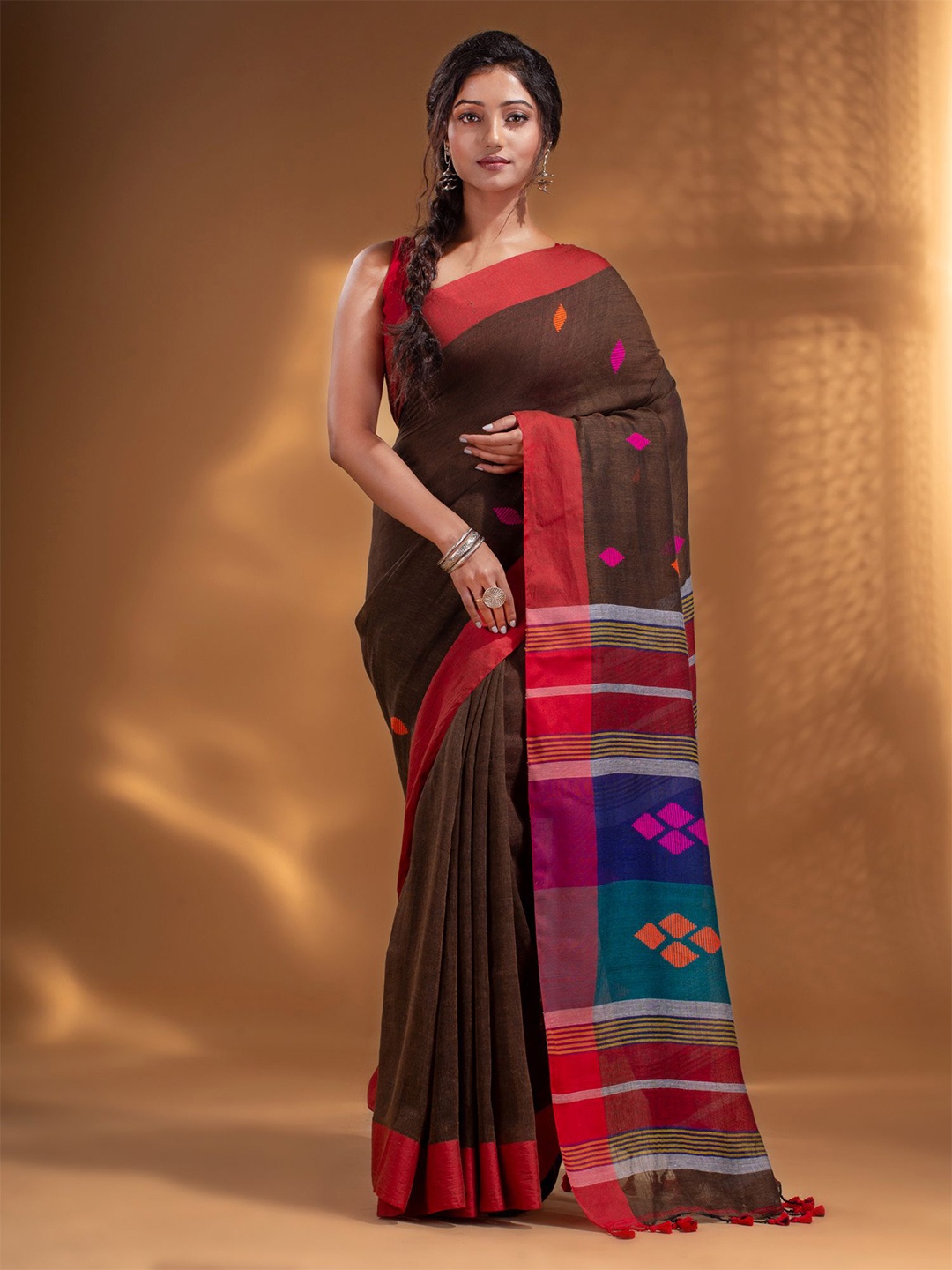 

Arhi Brown & Green Woven Design Zari Pure Linen Saree