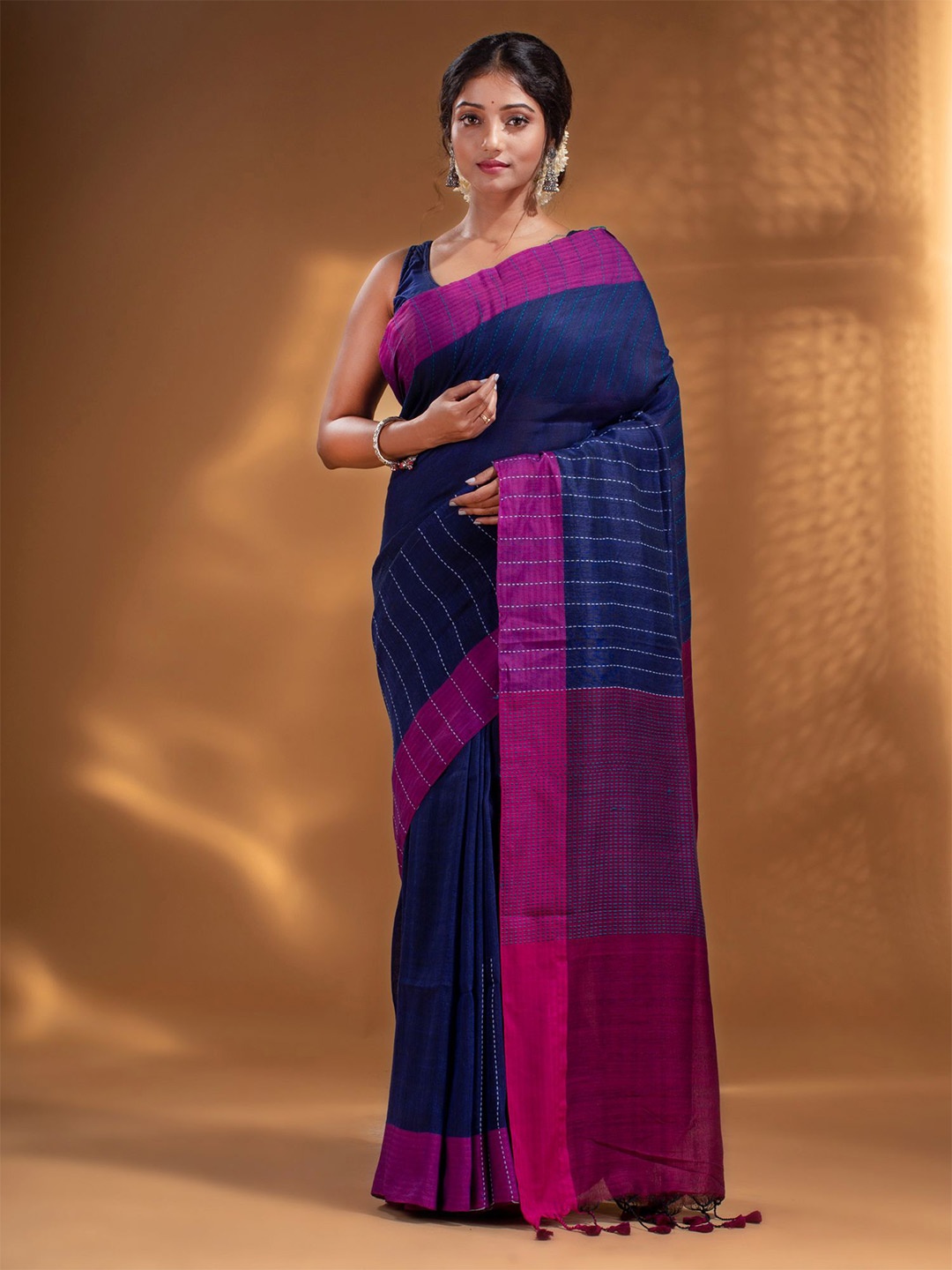 

Arhi Blue & White Woven Design Zari Pure Linen Saree