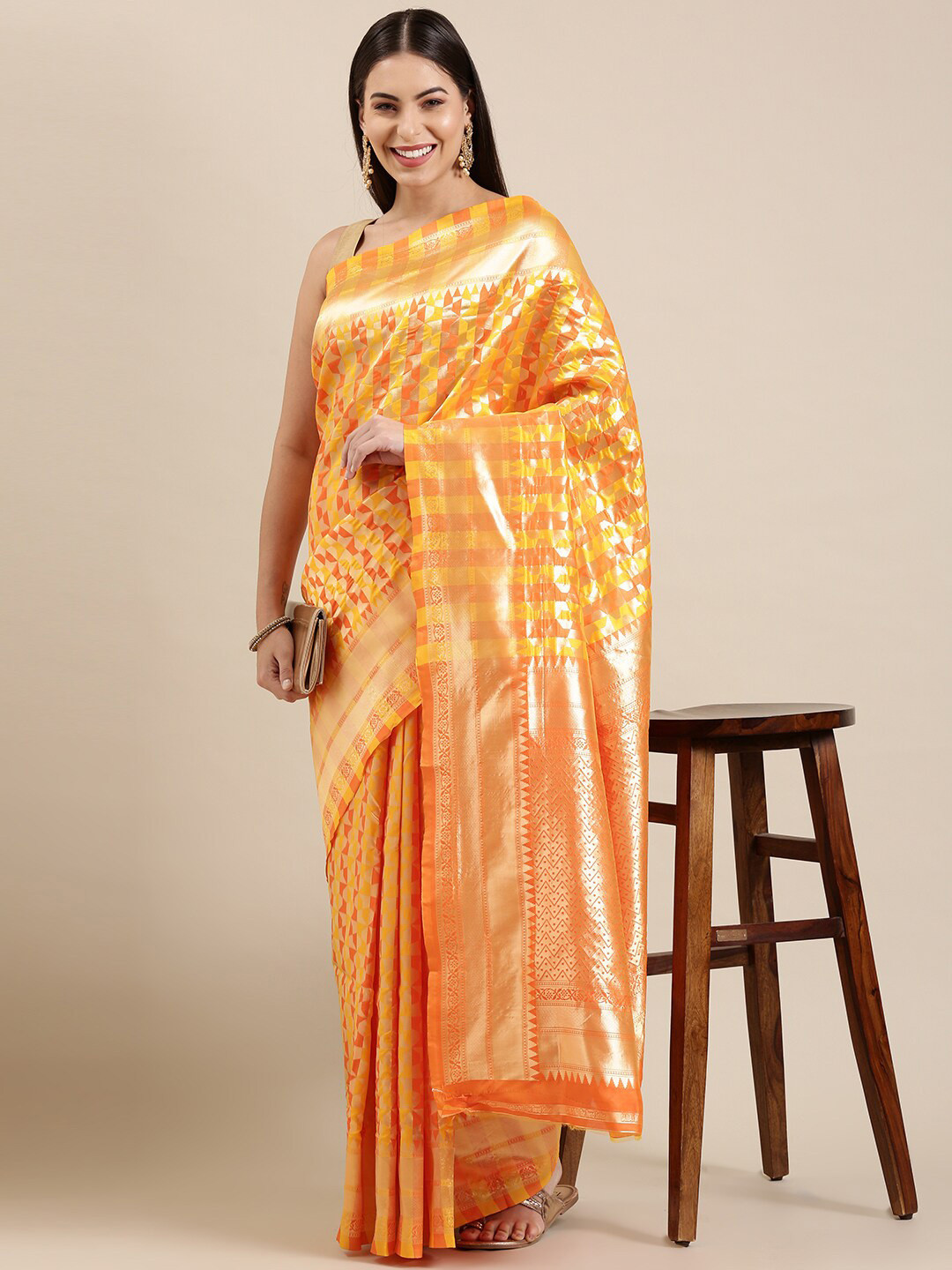 

The Chennai Silks Yellow & Gold-Toned Zari Silk Blend Patola Saree