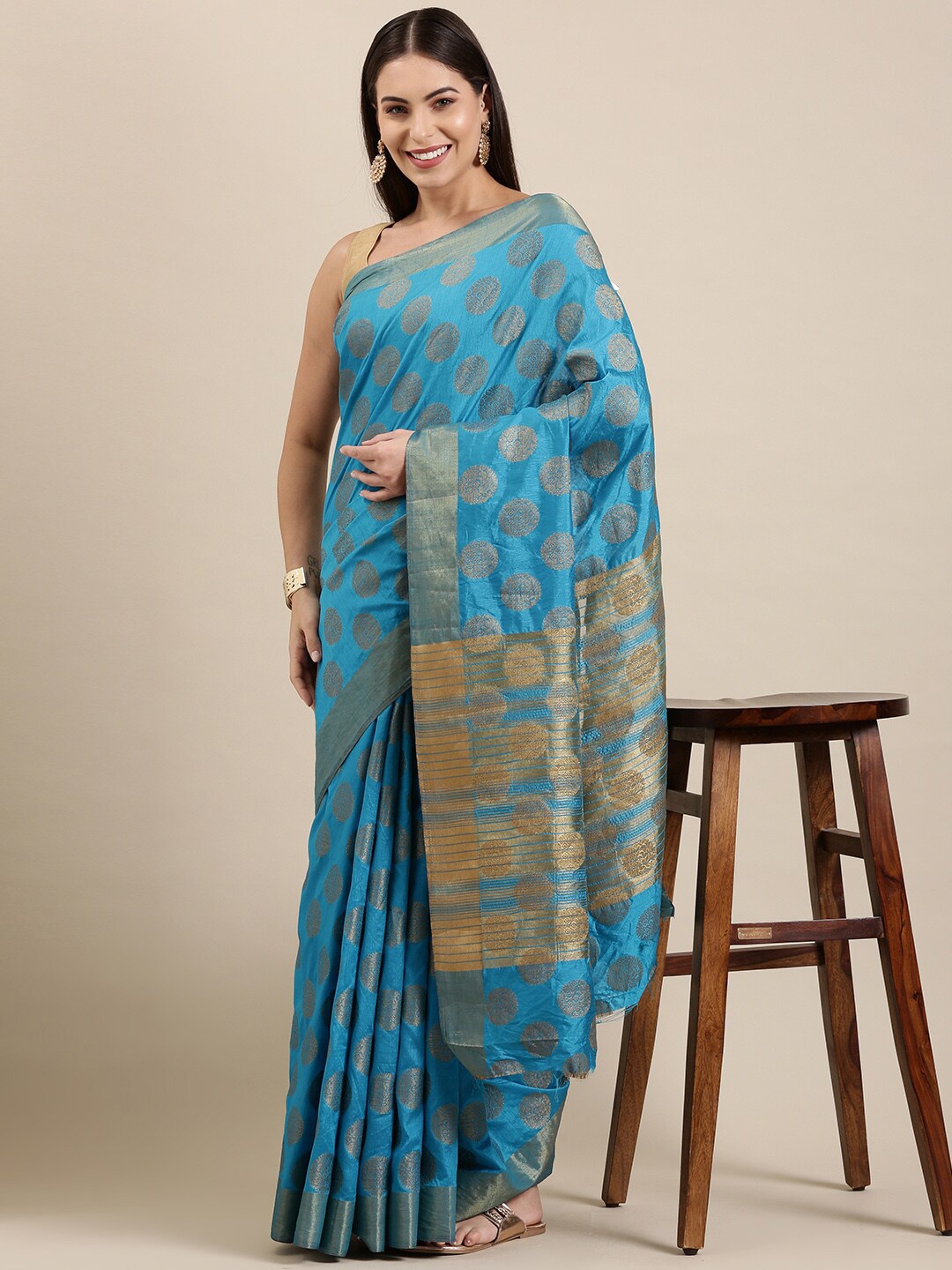 

The Chennai Silks Blue & Gold-Toned Ethnic Motifs Zari Jute Cotton Saree
