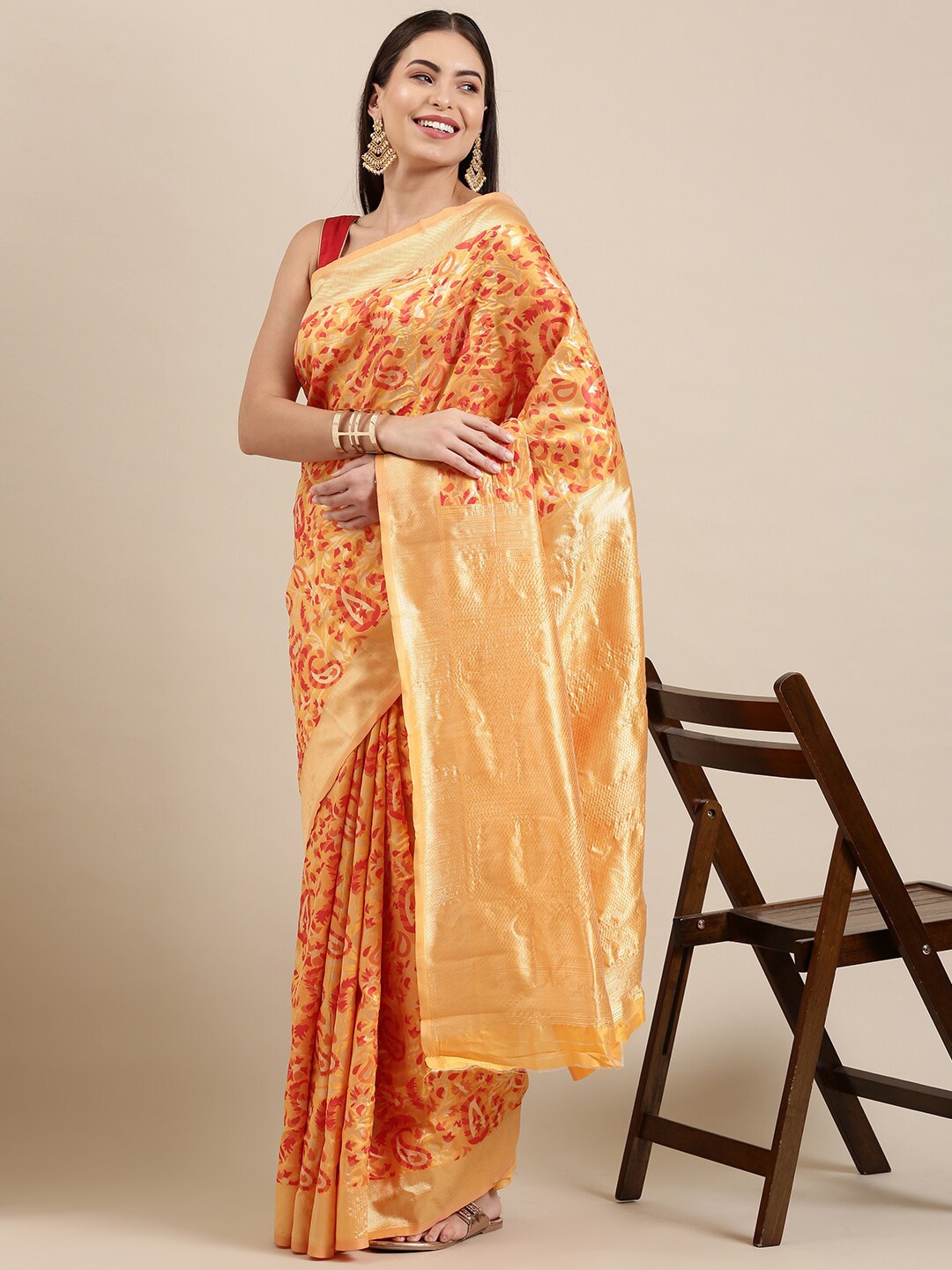 

The Chennai Silks Yellow & Orange Floral Zari Silk Blend Fusion Patola Saree