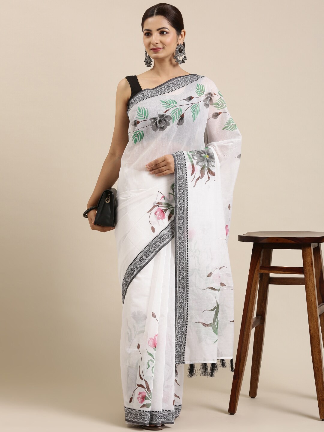

The Chennai Silks Off White & Green Floral Supernet Fusion Kota Saree