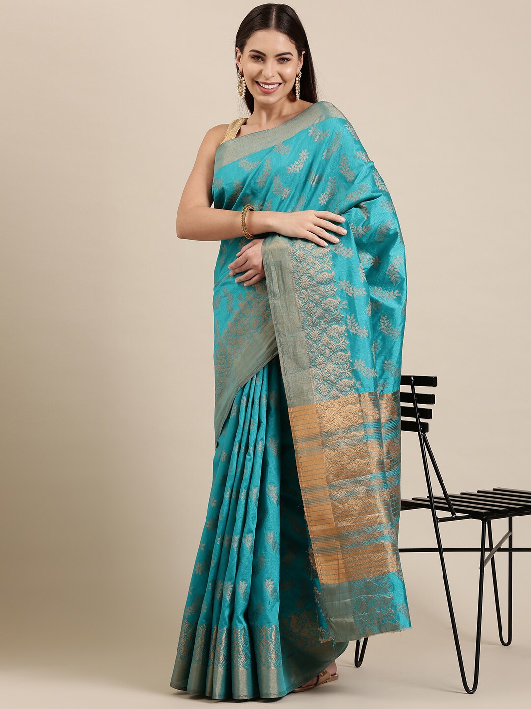 

The Chennai Silks Blue & Gold-Toned Floral Zari Jute Cotton Fusion Saree