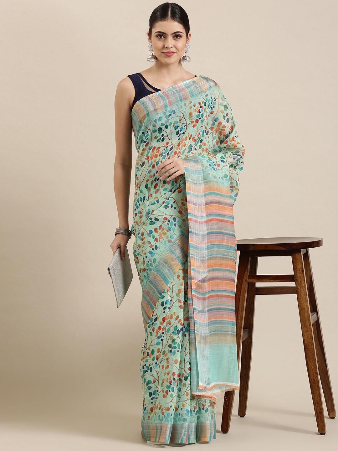 

The Chennai Silks Green & Orange Floral Zari Linen Blend Fusion Saree