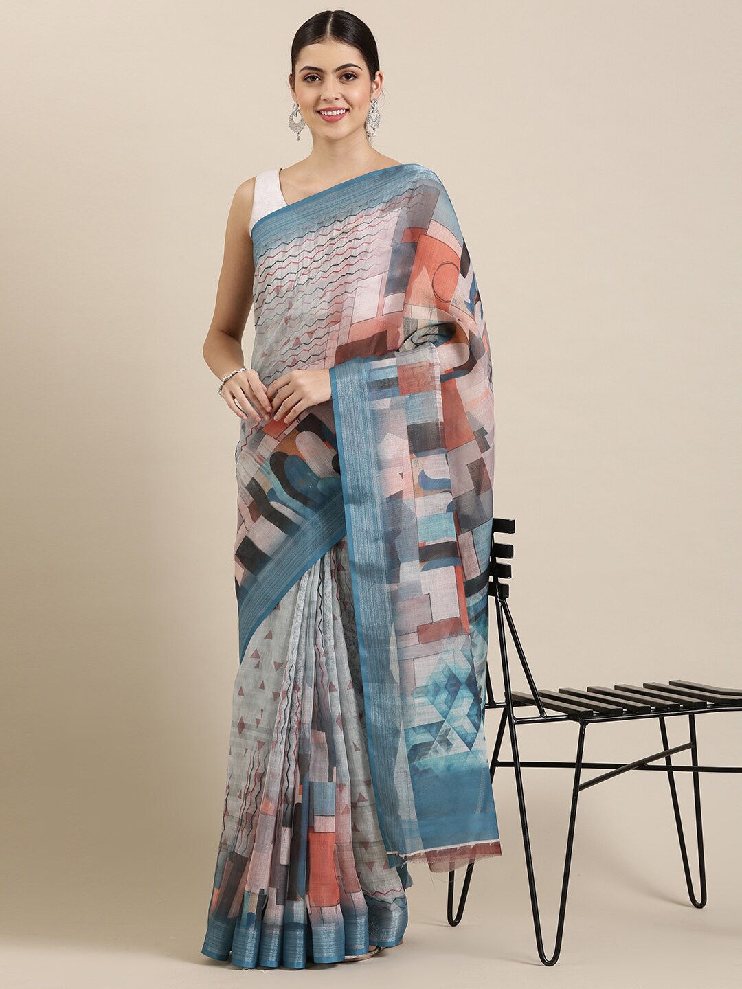 

The Chennai Silks White & Blue Zari Linen Blend Fusion Saree