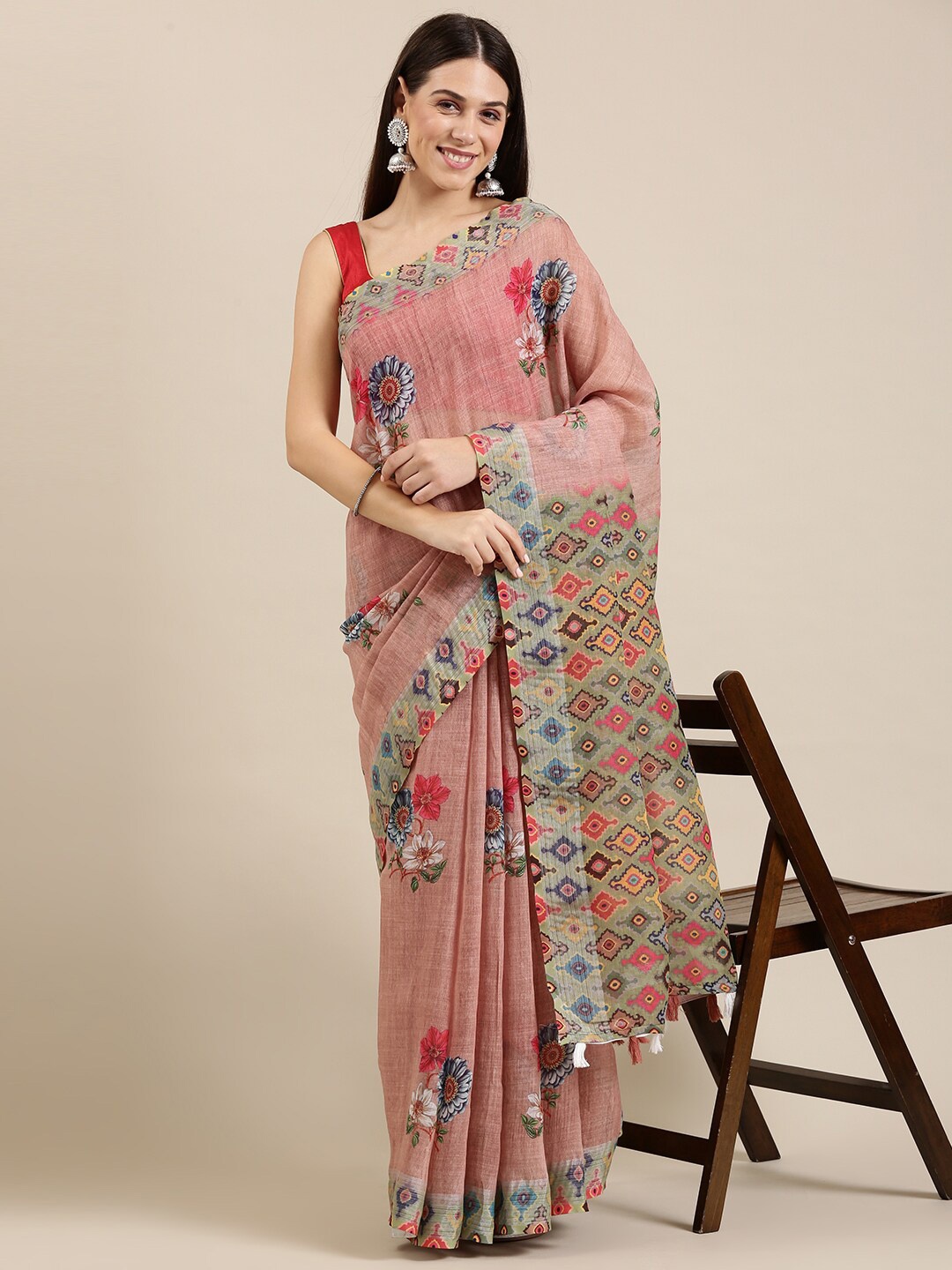 

The Chennai Silks Brown & Orange Floral Linen Blend Saree