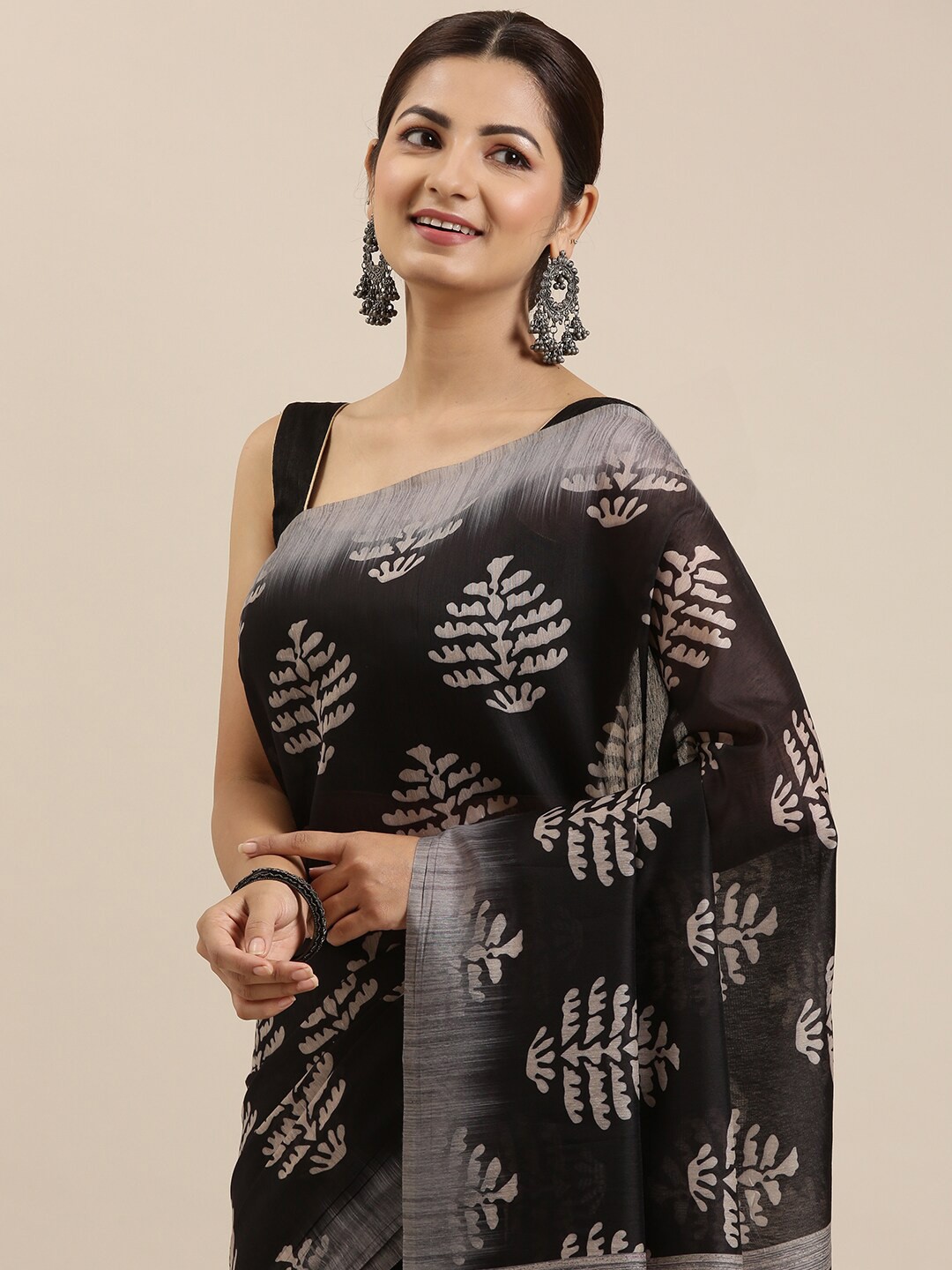 

The Chennai Silks Black & Beige Floral Zari Chanderi Saree
