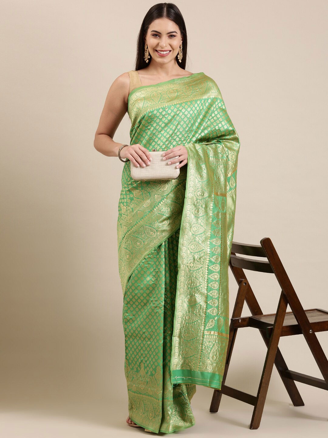 

The Chennai Silks Green & Gold-Toned Floral Zari Silk Blend Patola Saree