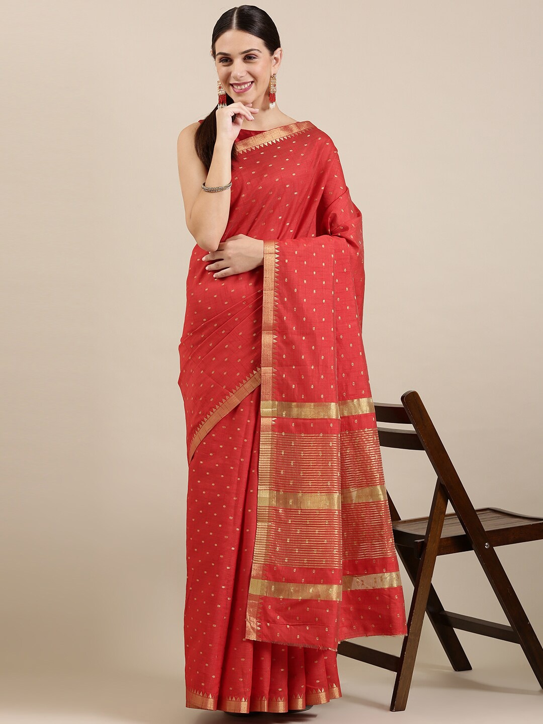 

The Chennai Silks Red & Gold-Toned Ethnic Motifs Zari Jute Cotton Saree