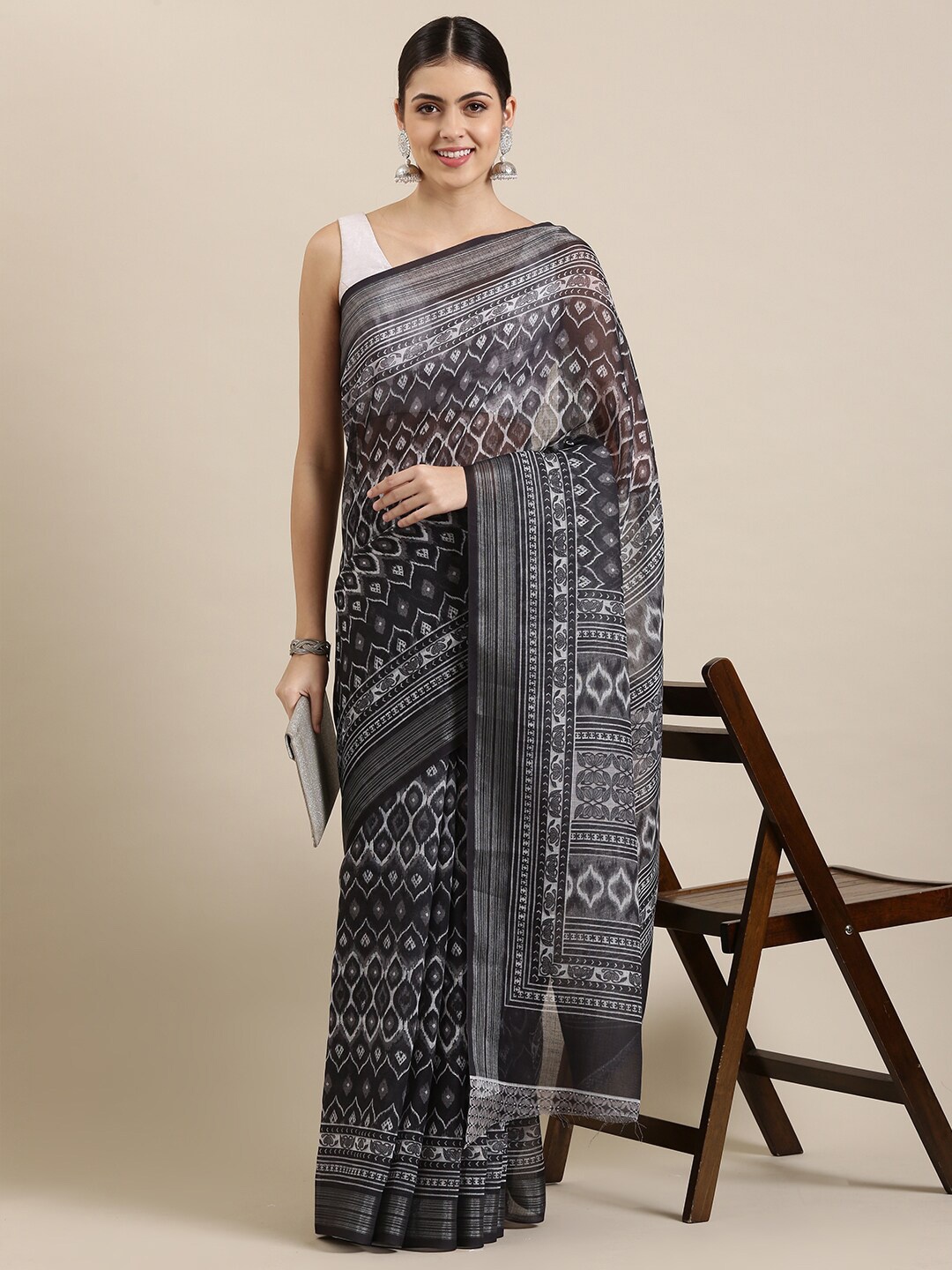 

The Chennai Silks Black & White Floral Zari Linen Blend Fusion Saree