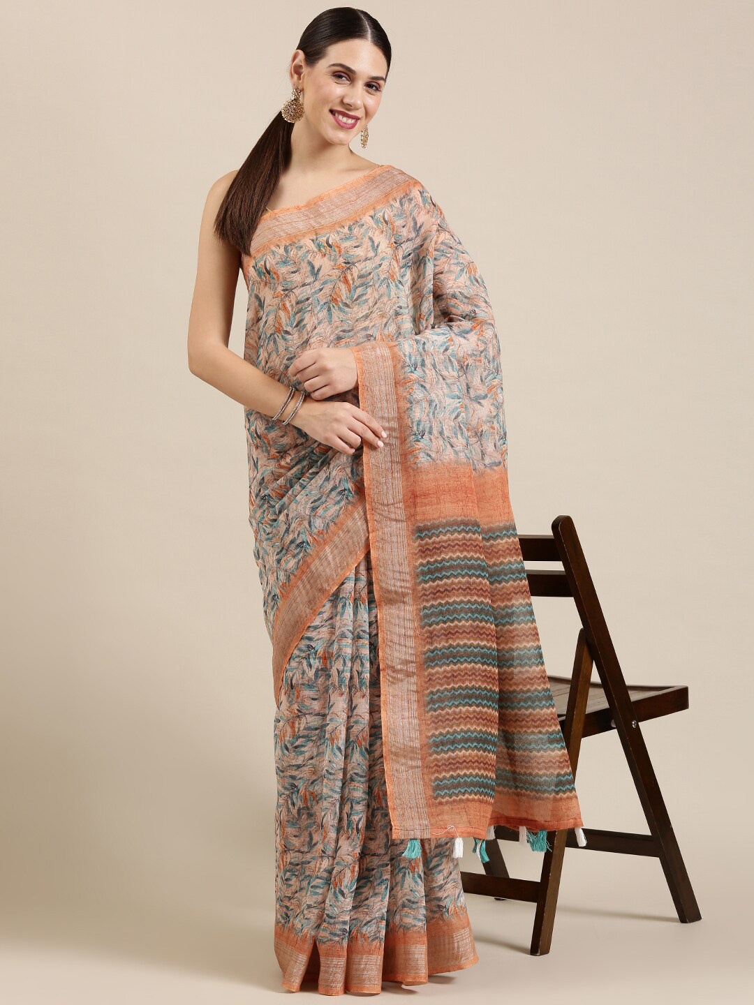 

The Chennai Silks White & Blue Floral Zari Linen Blend Saree