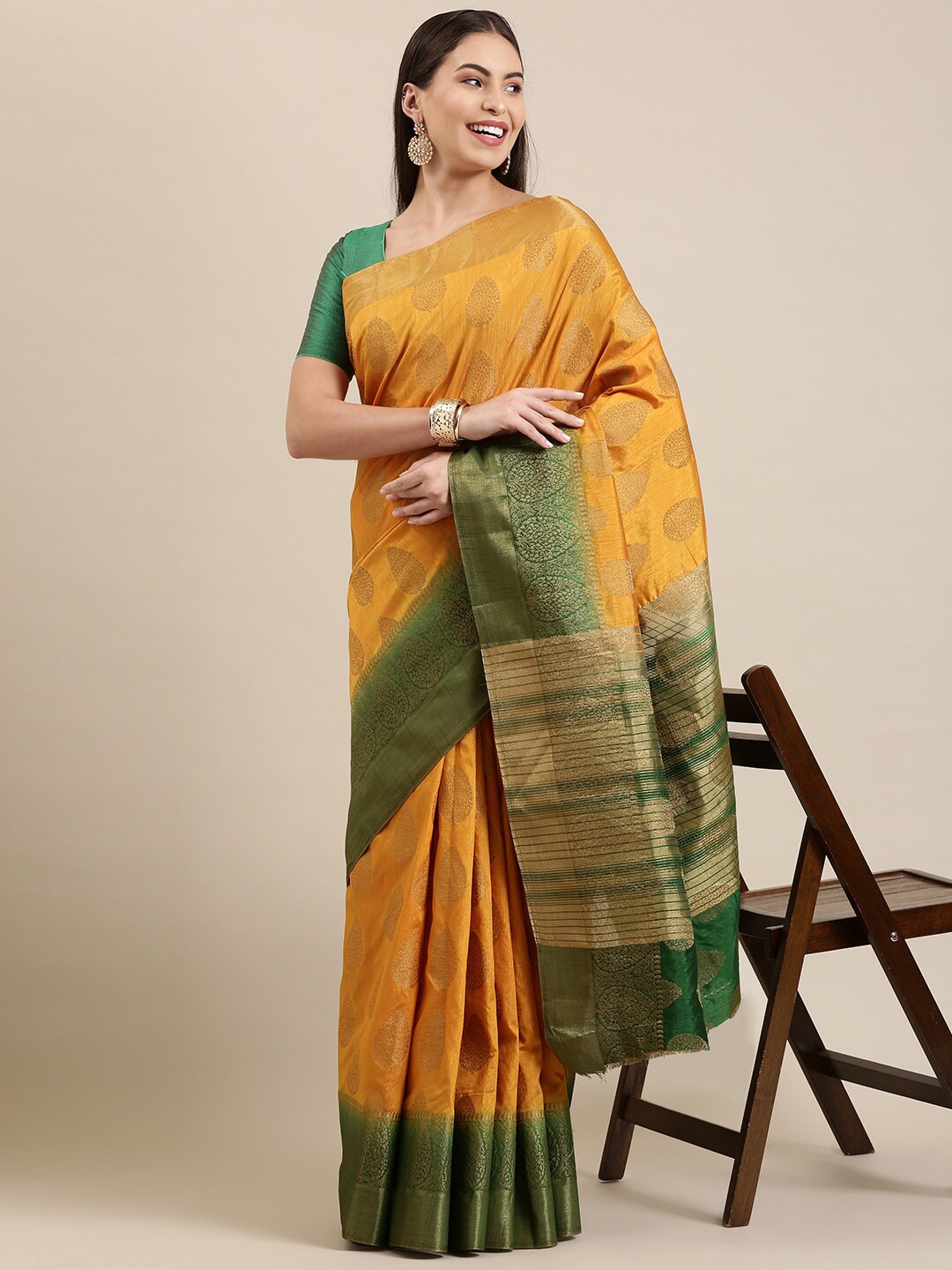 

The Chennai Silks Mustard & Green Ethnic Motifs Zari Jute Cotton Fusion Saree