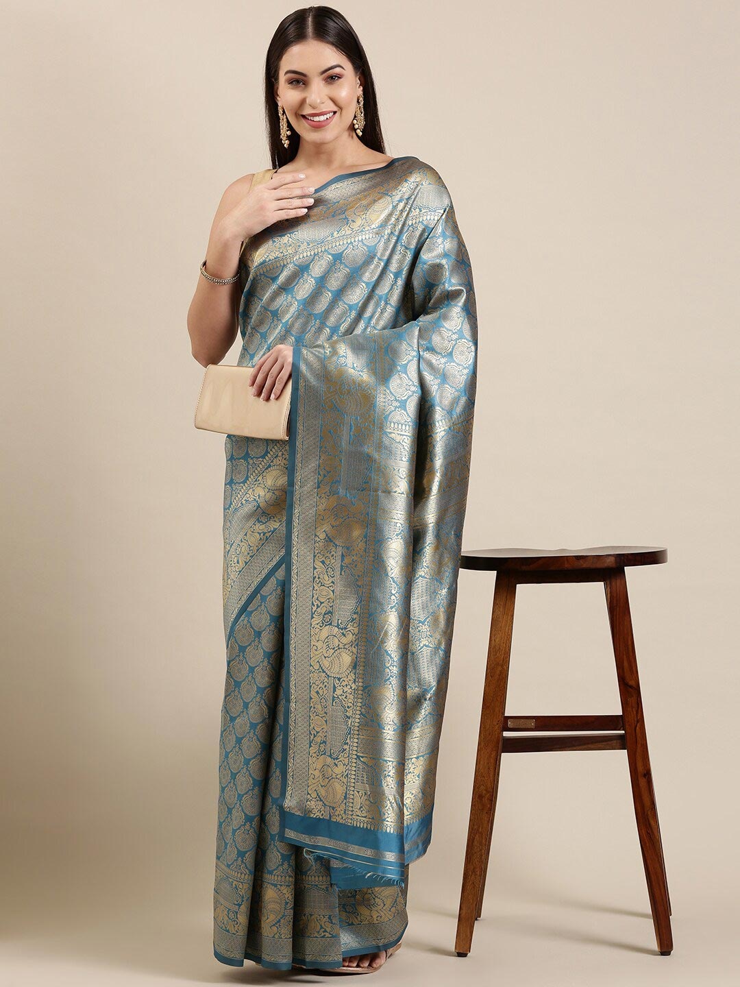 

The Chennai Silks Blue & Gold-Toned Floral Silk Blend Patola Saree