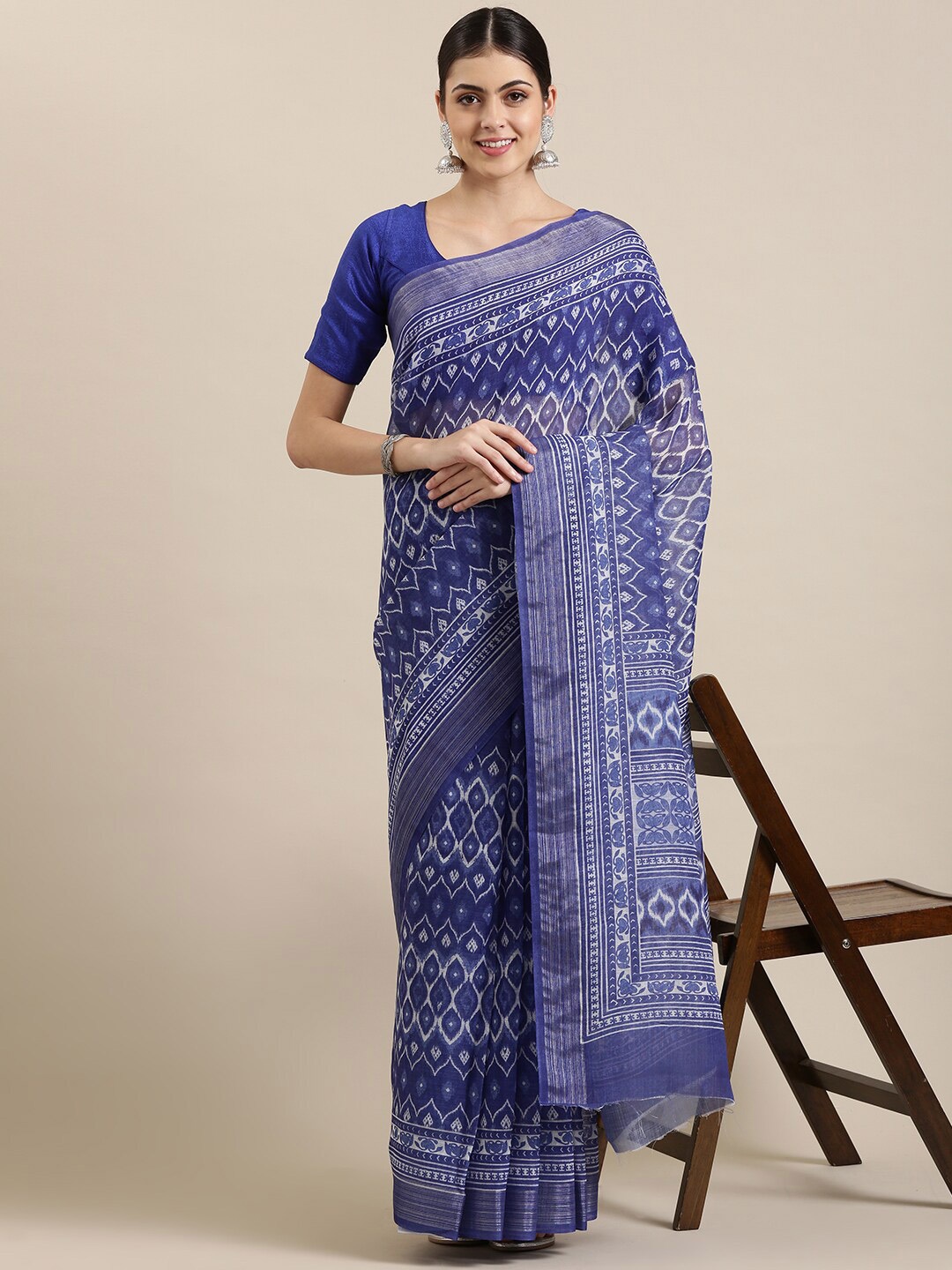 

The Chennai Silks Blue & Silver-Toned Floral Zari Linen Blend Fusion Saree