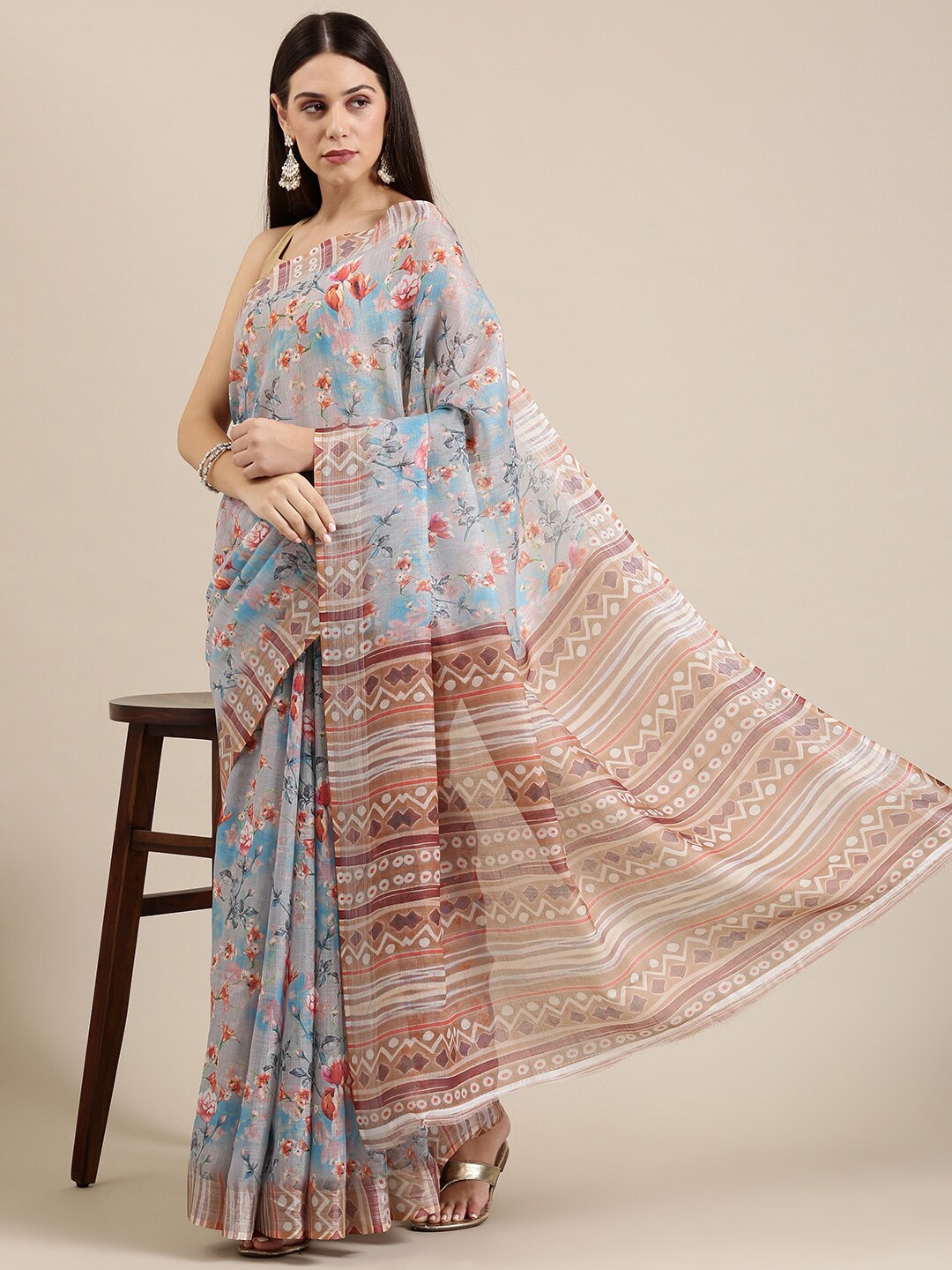 

The Chennai Silks Women Blue & Brown Floral Zari Linen Blend Saree