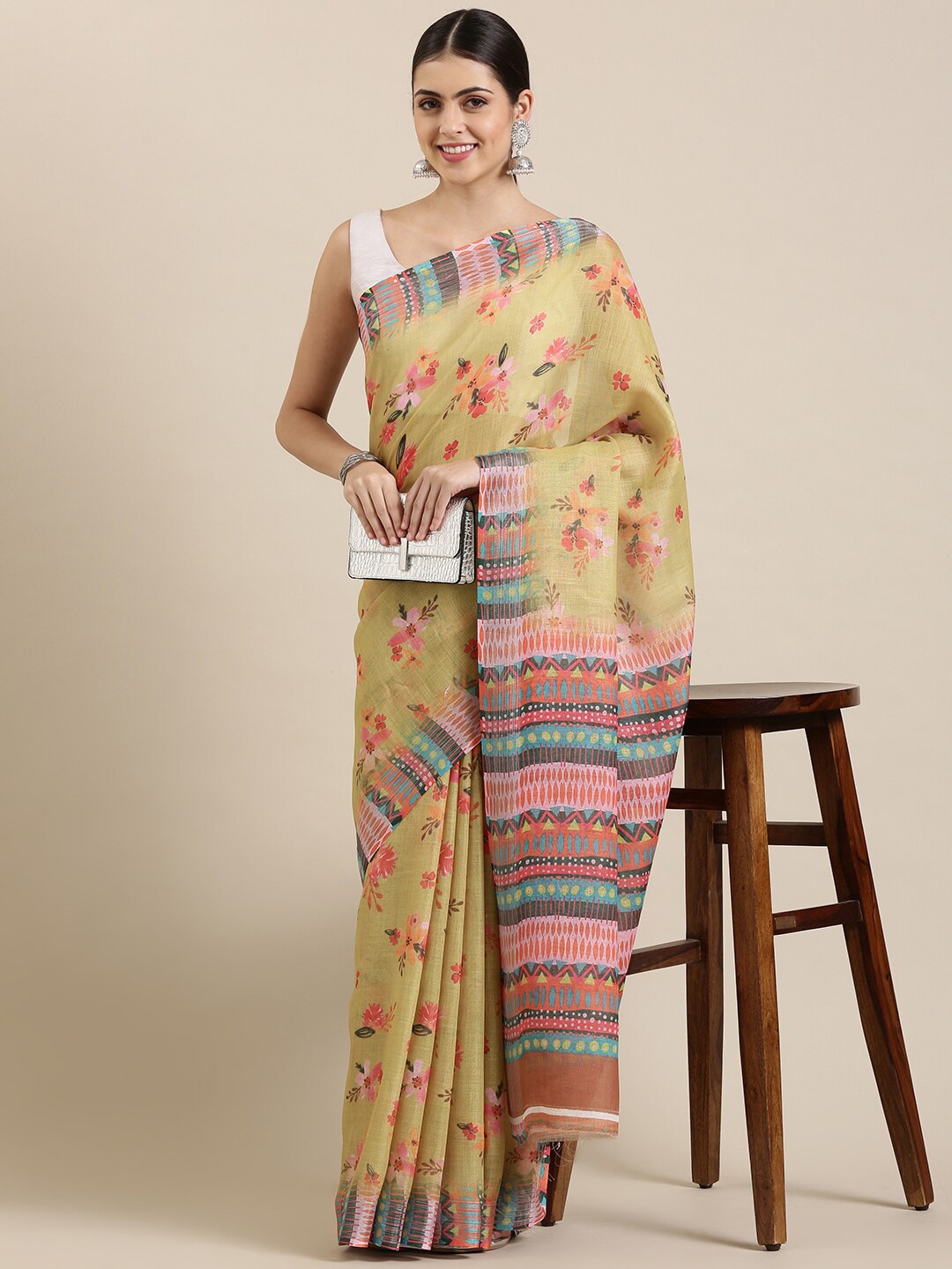 

The Chennai Silks Green & Pink Floral Zari Linen Blend Fusion Saree