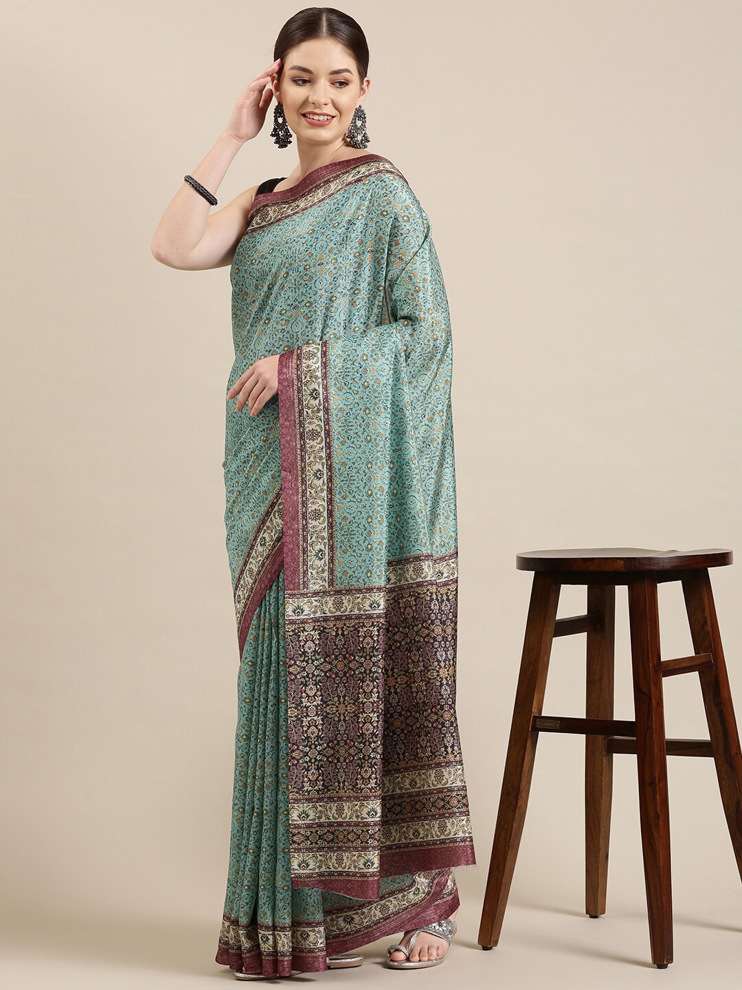 

The Chennai Silks Green Floral Polyester Saree