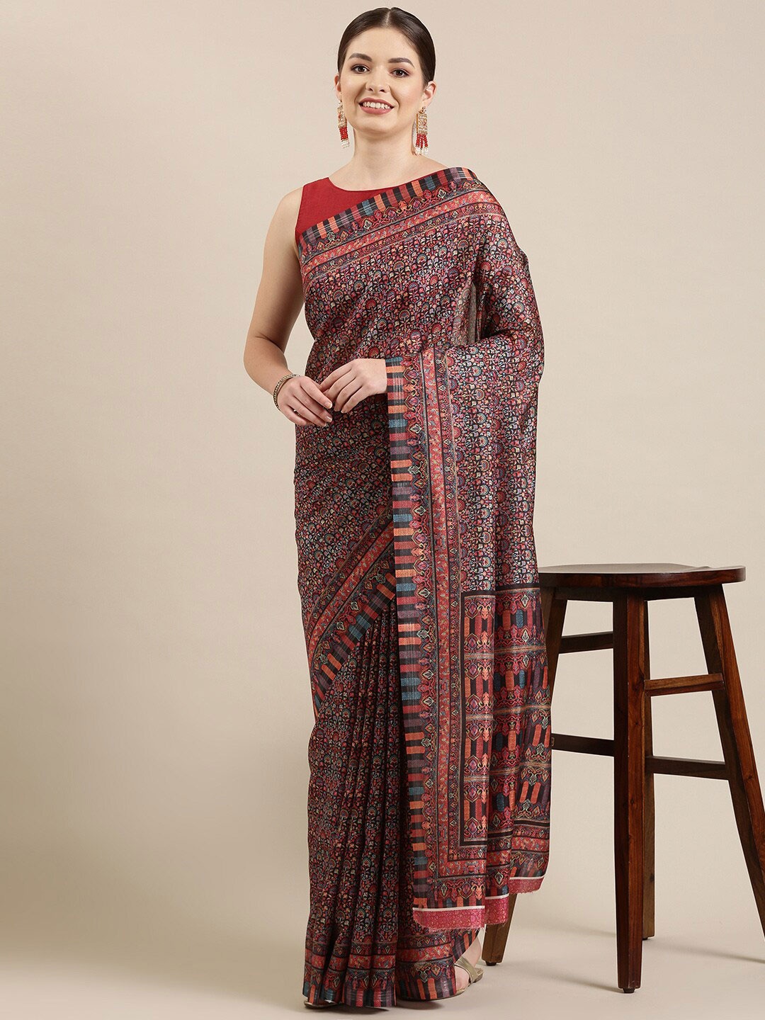 

The Chennai Silks Black & Orange Floral Saree