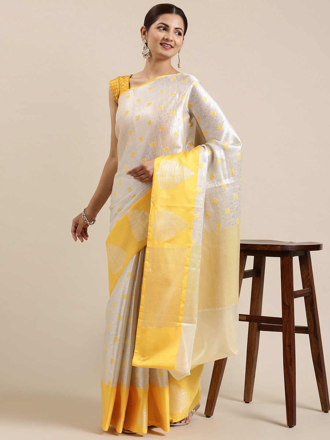 

The Chennai Silks Silver-Toned & Yellow Woven Design Zari Organza Banarasi Saree
