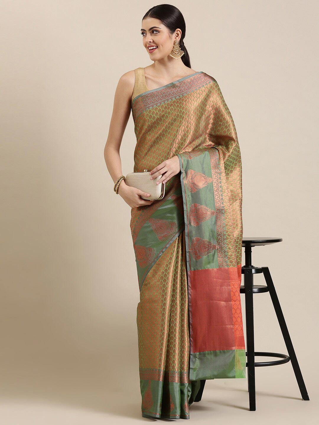 

The Chennai Silks Green & Orange Ethnic Motifs Zari Organza Banarasi Saree