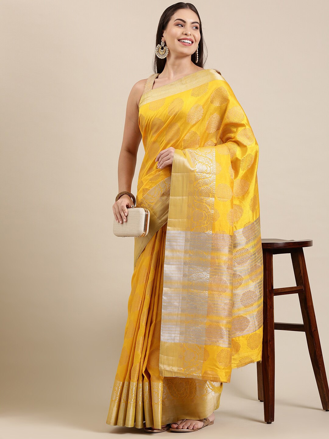 

The Chennai Silks Yellow & Gold-Toned Ethnic Motifs Zari Jute Cotton Saree