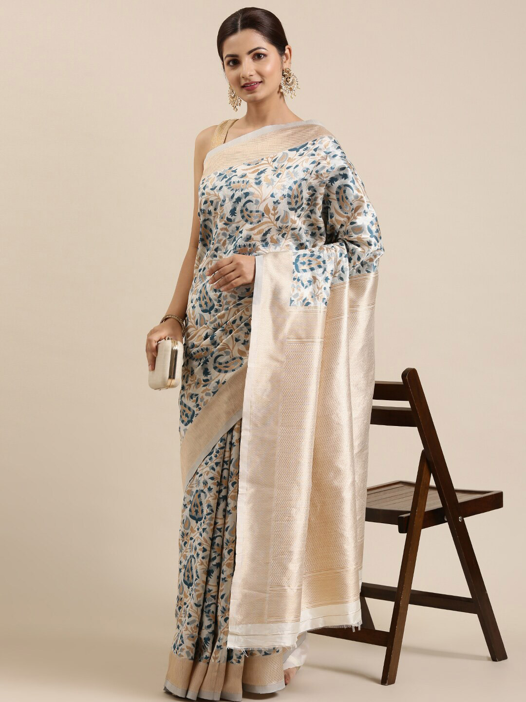 

The Chennai Silks Off White & Navy Blue Floral Zari Silk Blend Patola Saree