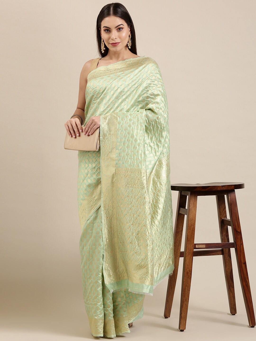 

The Chennai Silks Green & Gold Woven Design Zari Silk Blend Patola Saree